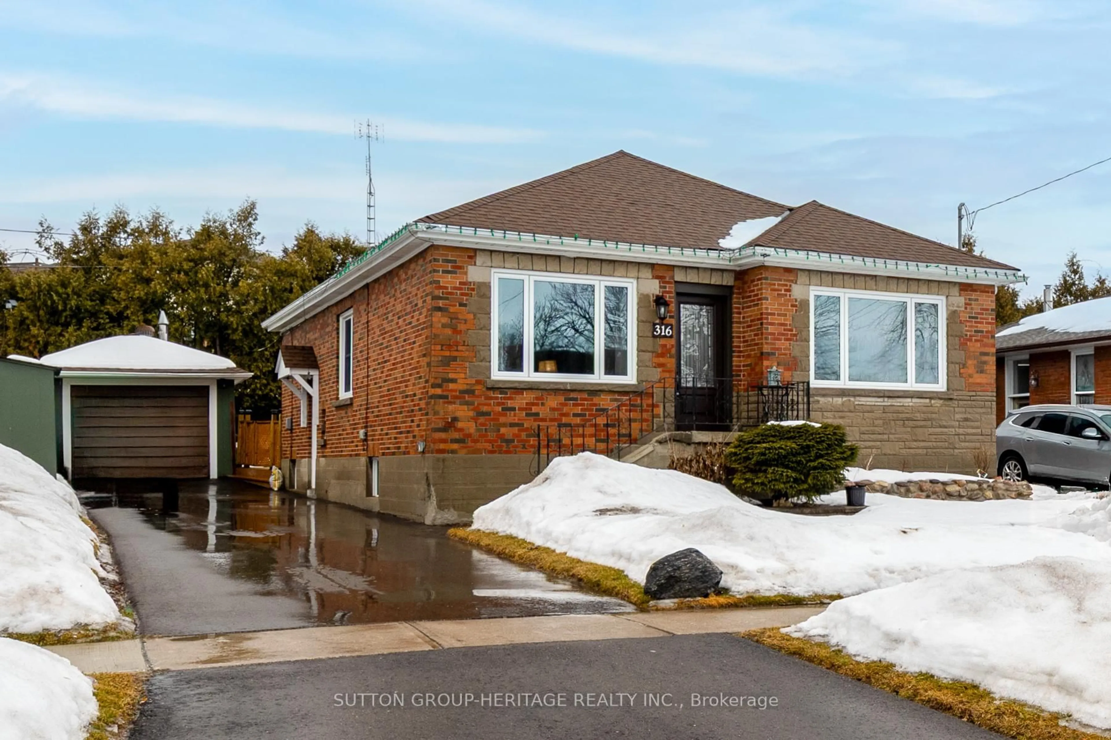 Home with brick exterior material, street for 316 Central Park Blvd, Oshawa Ontario L1H 5X1