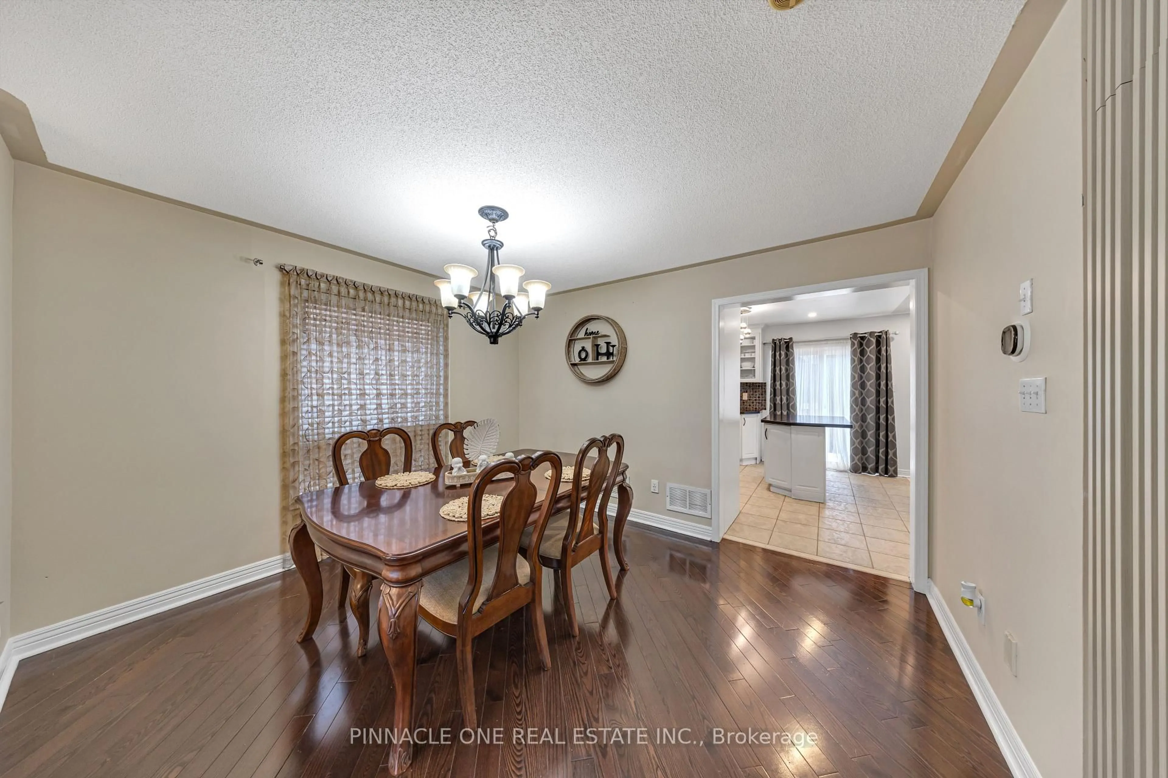 Dining room, wood/laminate floor for 27 Grackle Tr, Toronto Ontario M1X 2A4