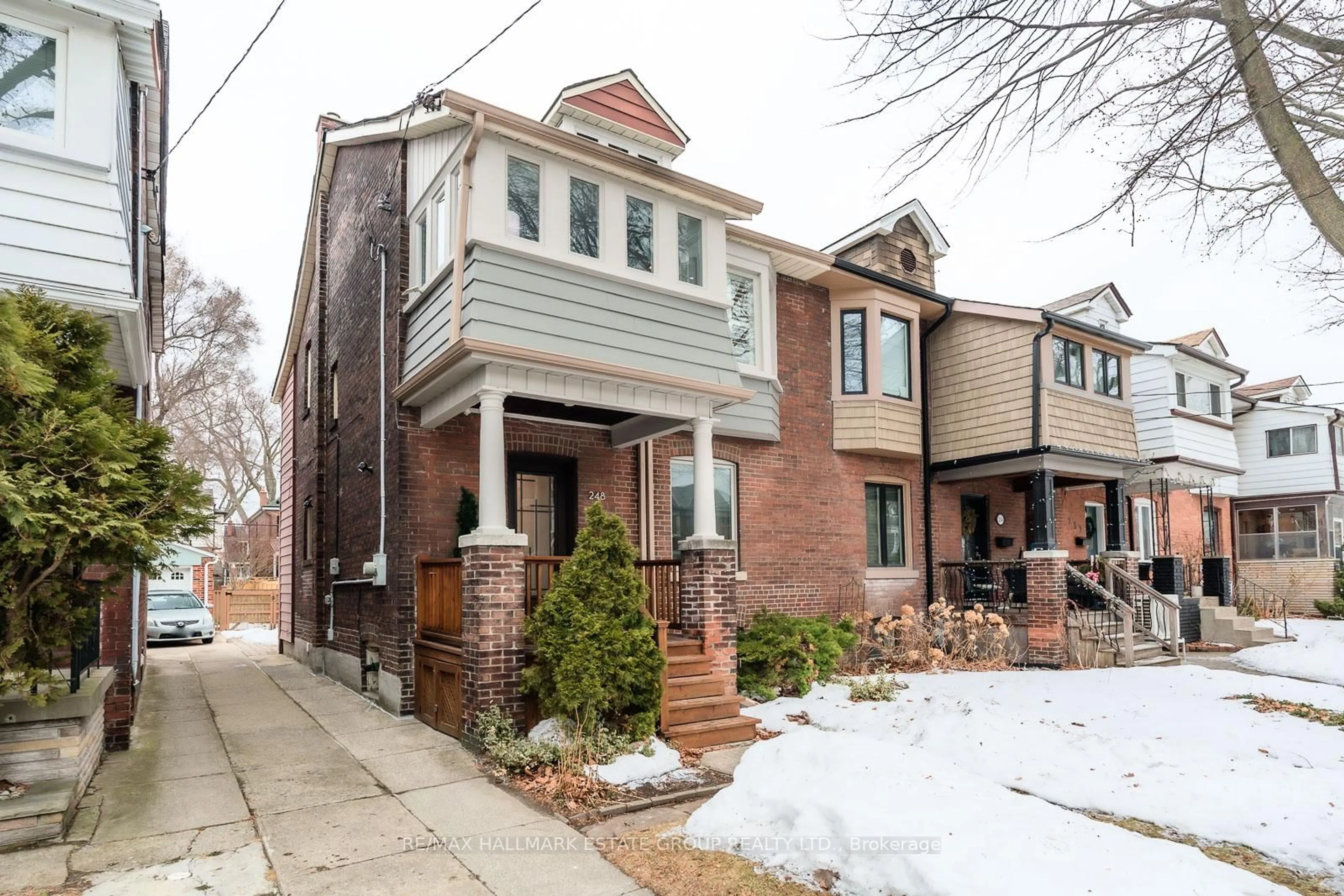 Home with brick exterior material, street for 248 Strathmore Blvd, Toronto Ontario M4J 1P6