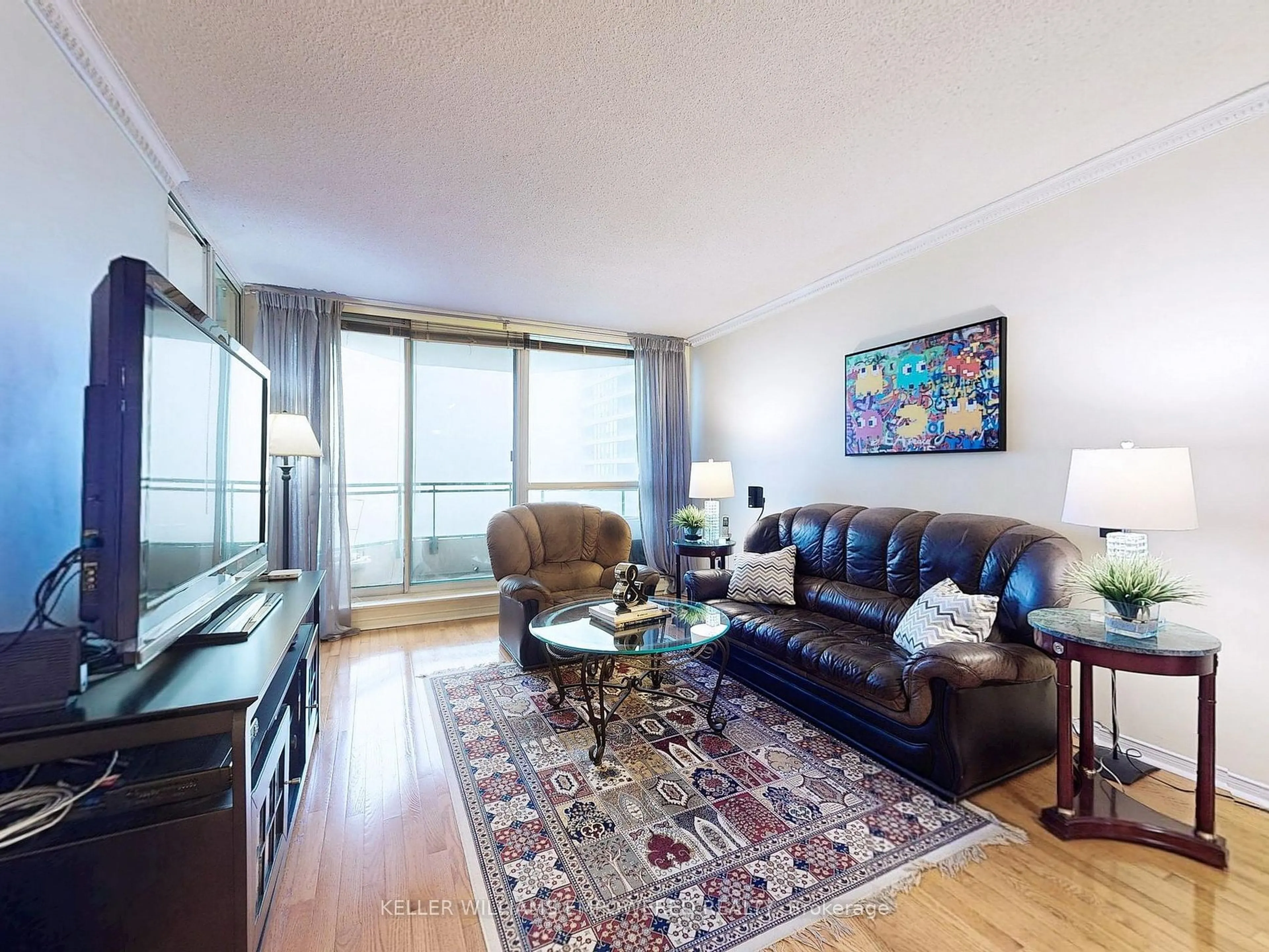 Living room with furniture, wood/laminate floor for 4727 Sheppard Ave #1007, Toronto Ontario M1S 5B3