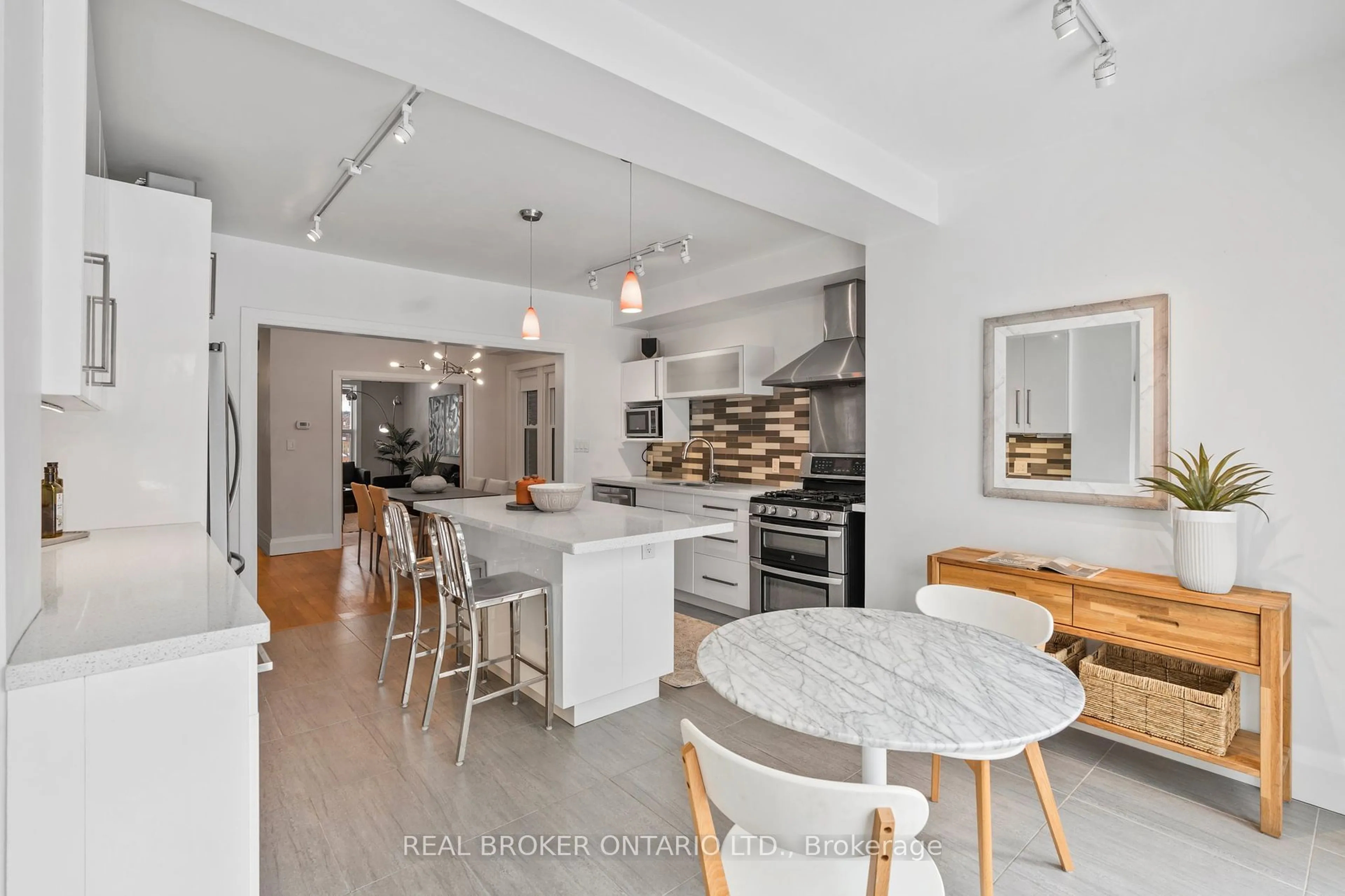 Open concept kitchen, ceramic/tile floor for 32 Monarch Park Ave, Toronto Ontario M4J 4P8