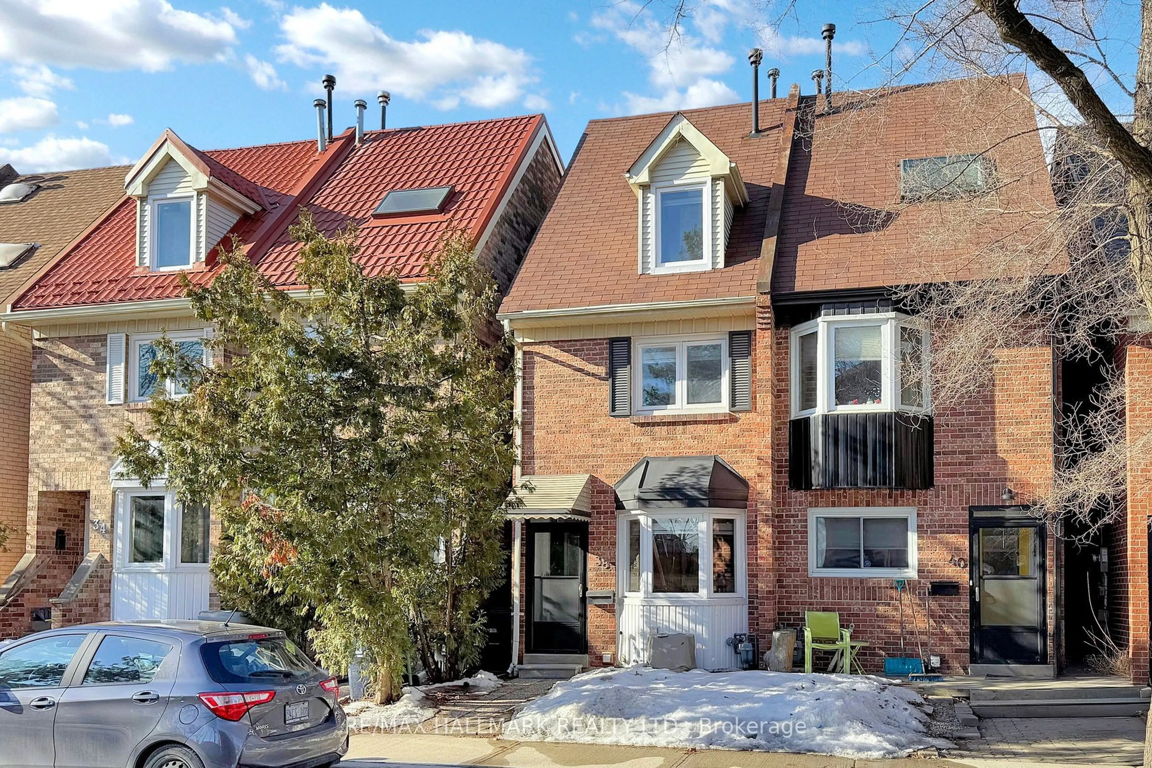 Home with brick exterior material, street for 38 Torbrick Rd, Toronto Ontario M4J 4Z5