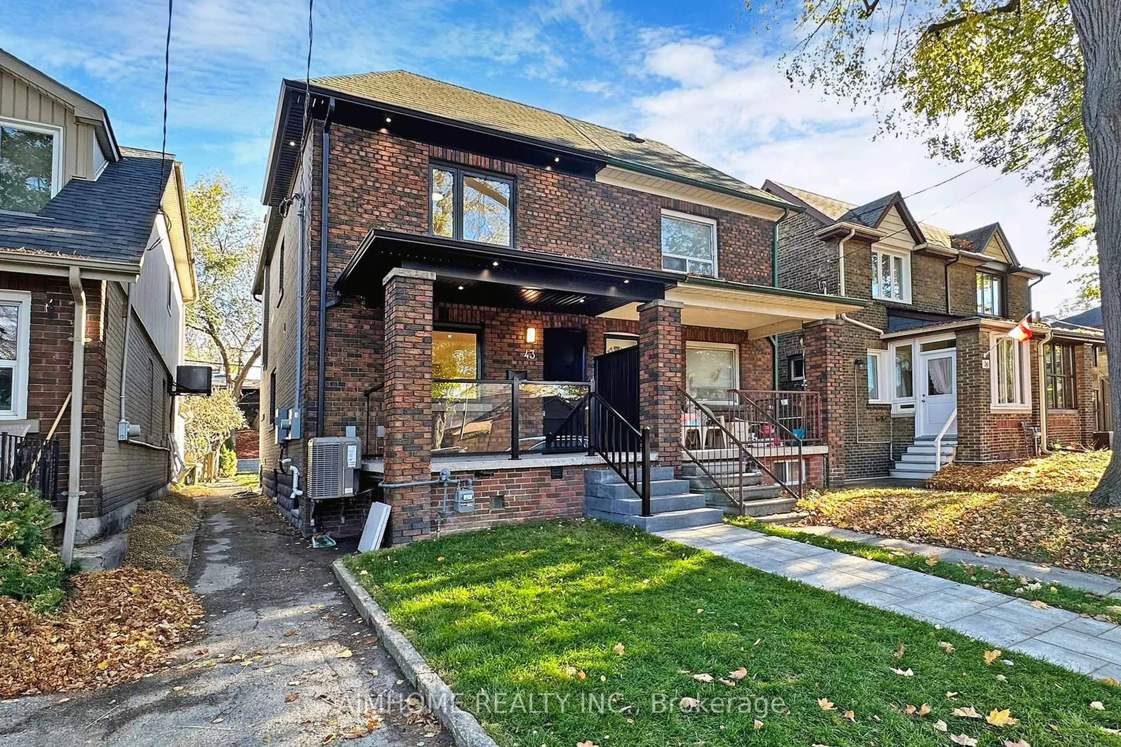 Home with brick exterior material, street for 43 Highfield Rd, Toronto Ontario M4L 2T9