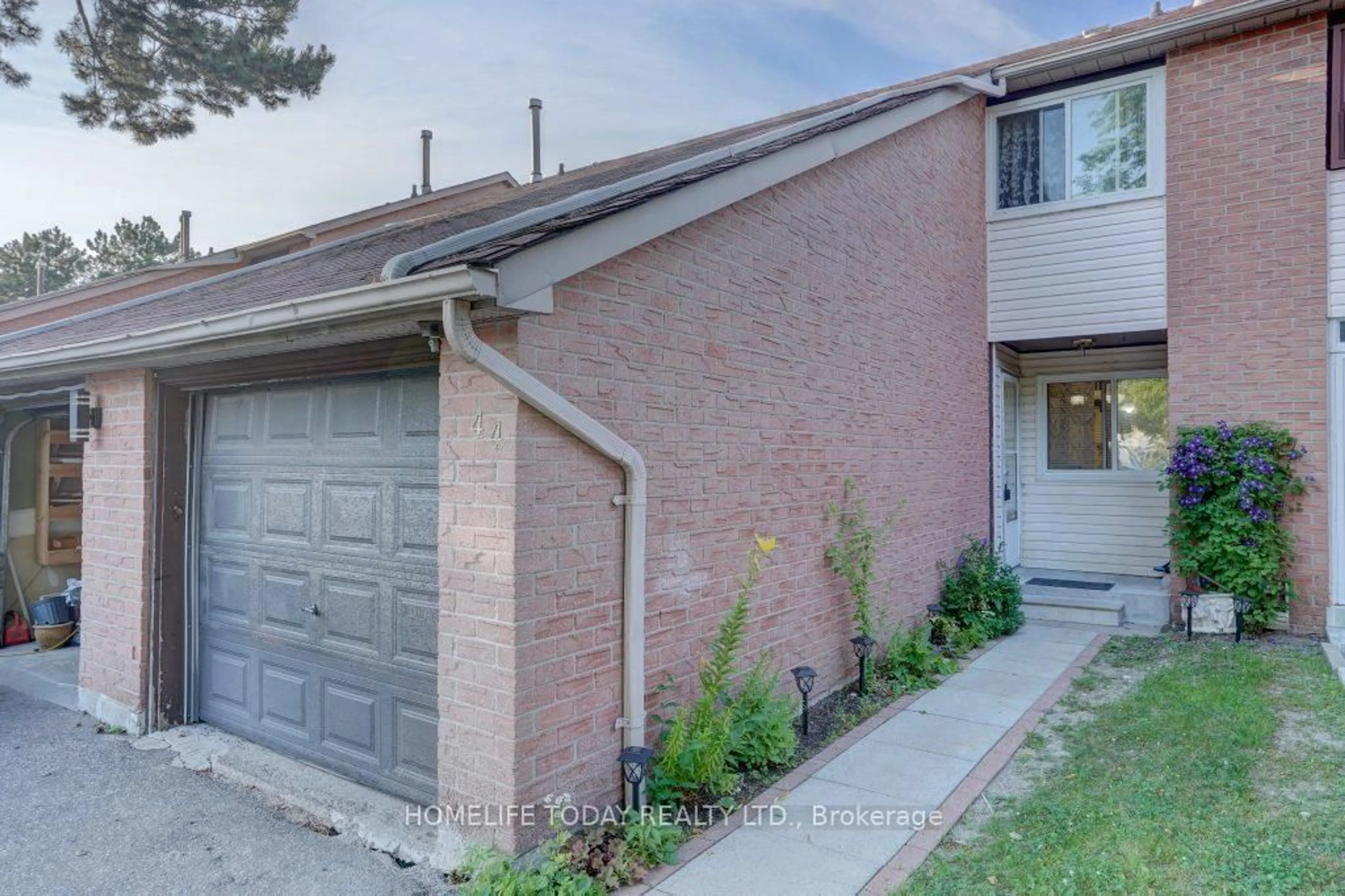 Home with brick exterior material, street for 161 Wickson Tr #44, Toronto Ontario M1B 1M4