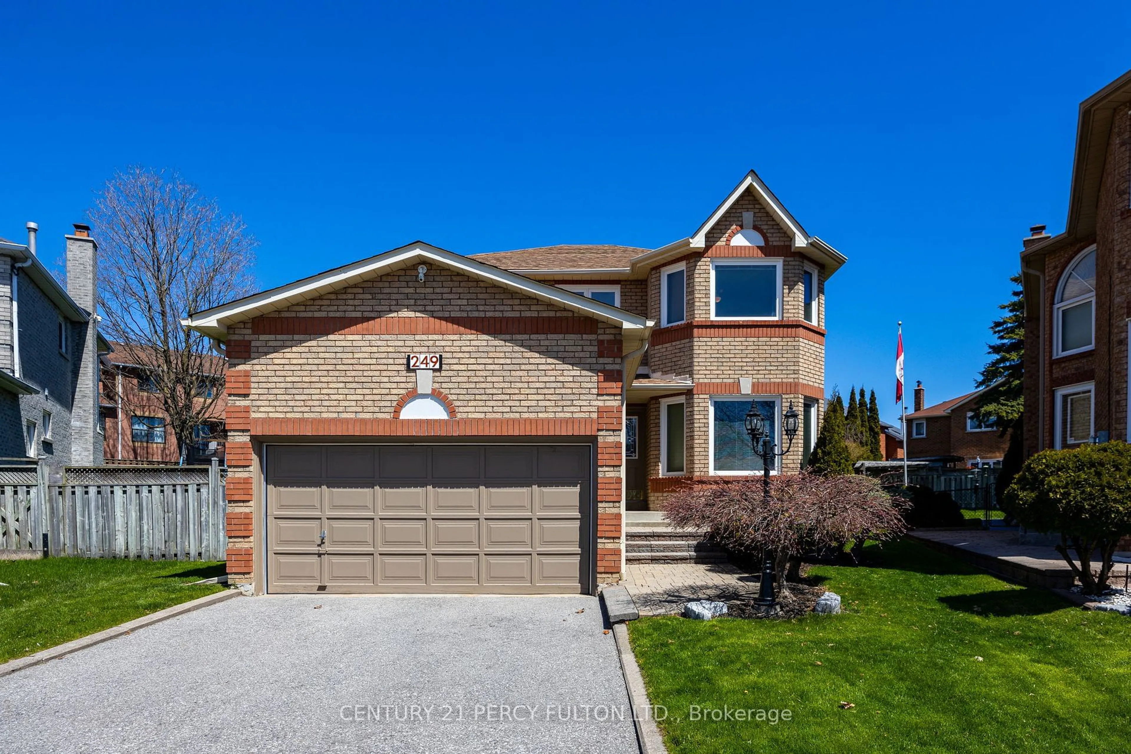 Home with brick exterior material, street for 249 Mossbrook Sq, Pickering Ontario L1V 6P9