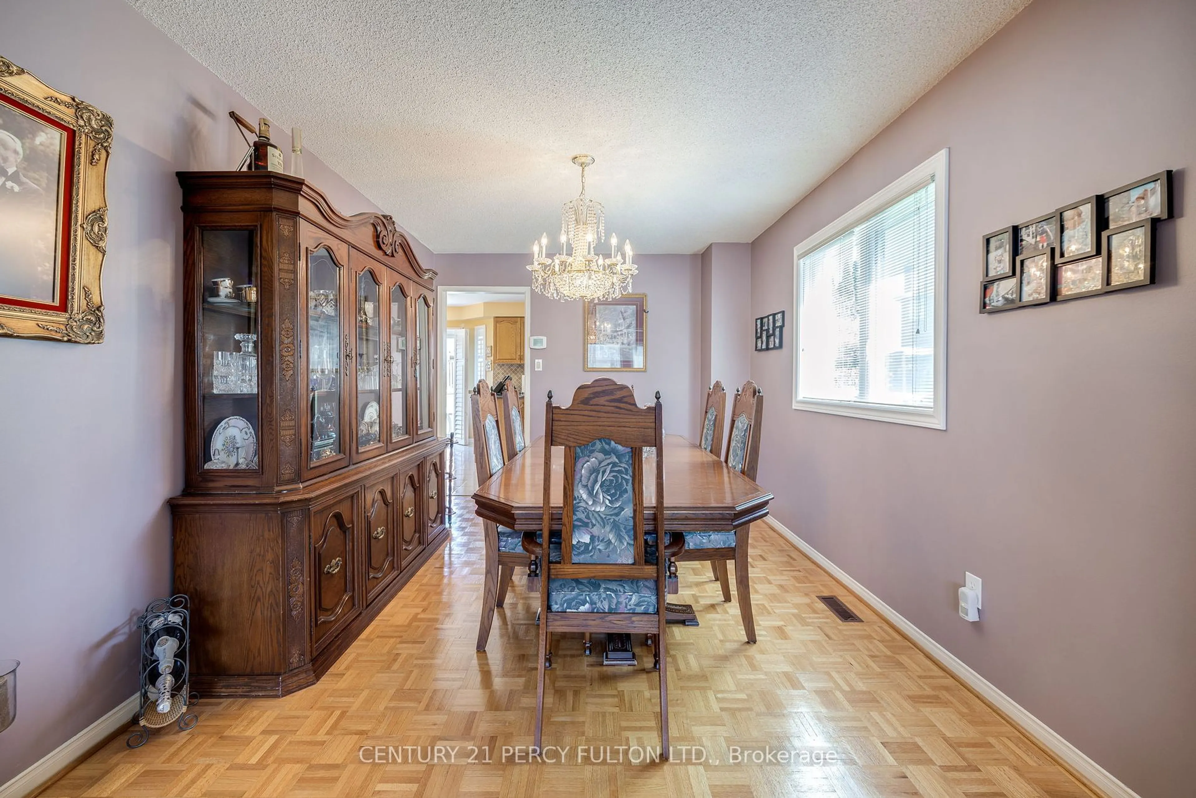 Dining room, wood/laminate floor for 249 Mossbrook Sq, Pickering Ontario L1V 6P9