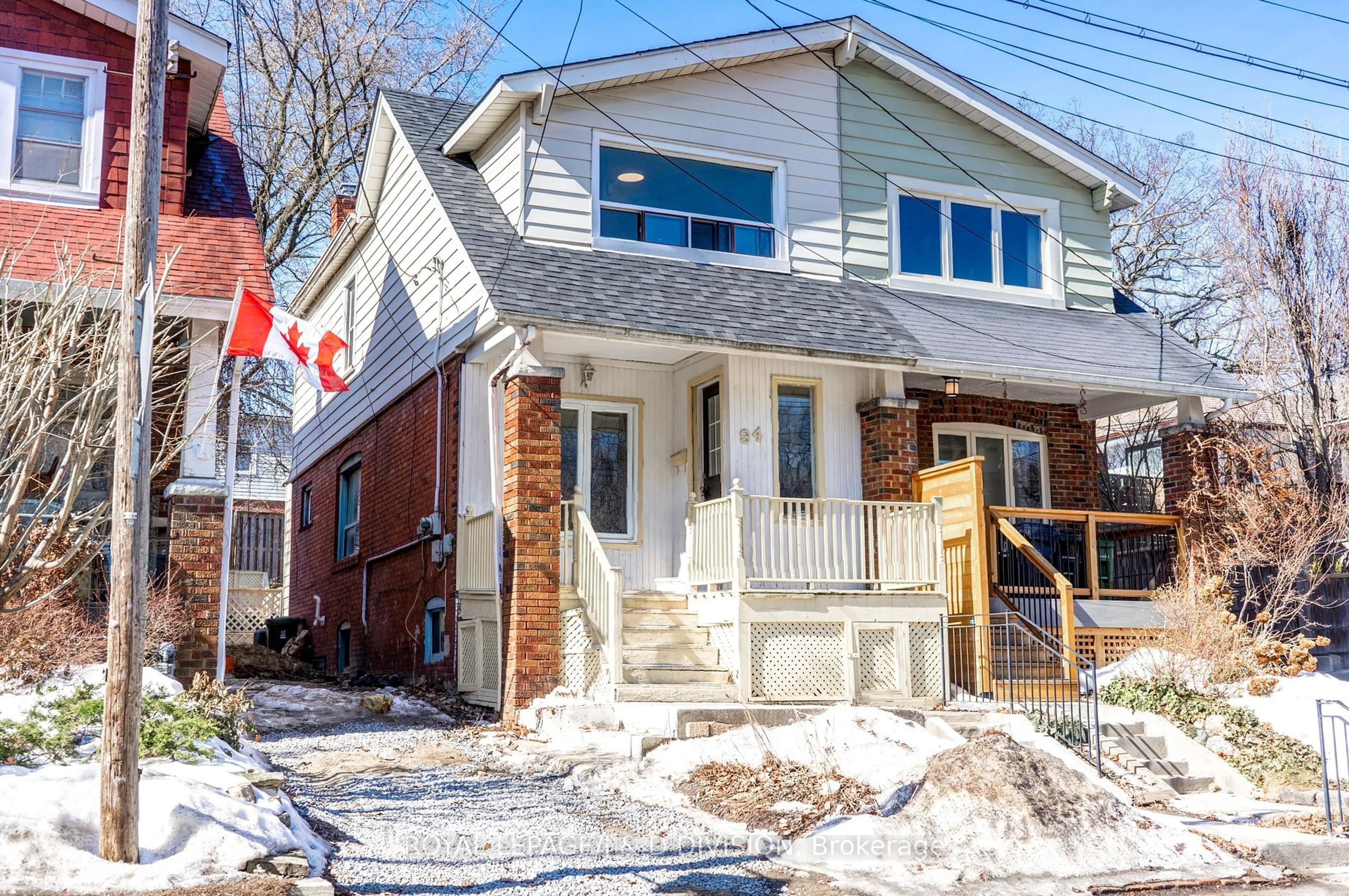 Home with brick exterior material, street for 94 Brookside Dr, Toronto Ontario M4E 2M1