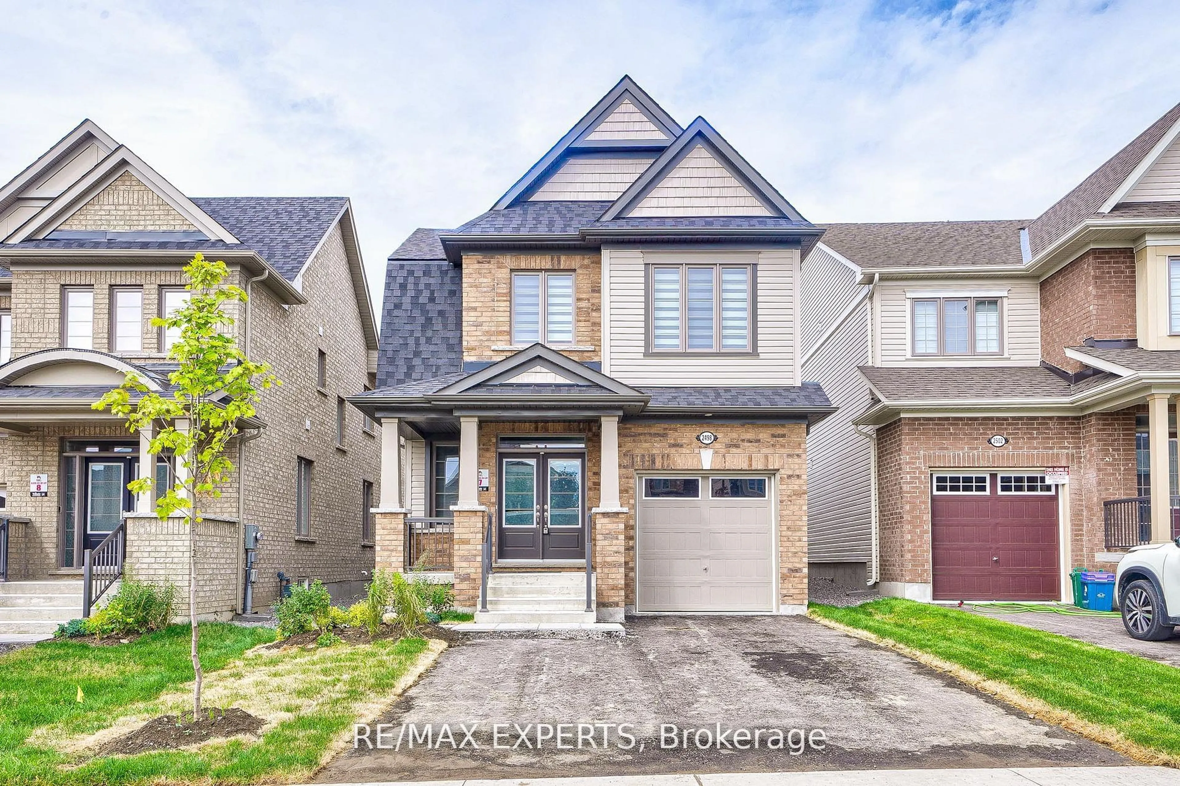 Home with brick exterior material, street for 2498 Kentucky Derby Way, Oshawa Ontario L1H 7K4