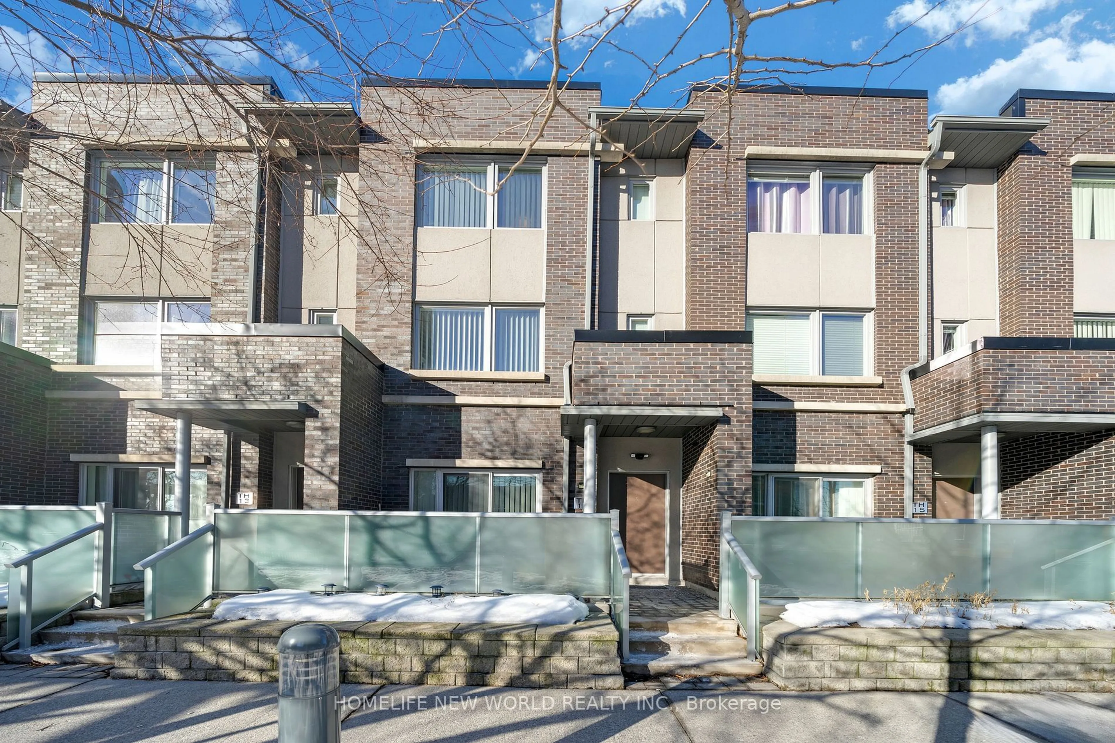 Home with brick exterior material, street for 310 Village Green Sq #14, Toronto Ontario M1S 0L1