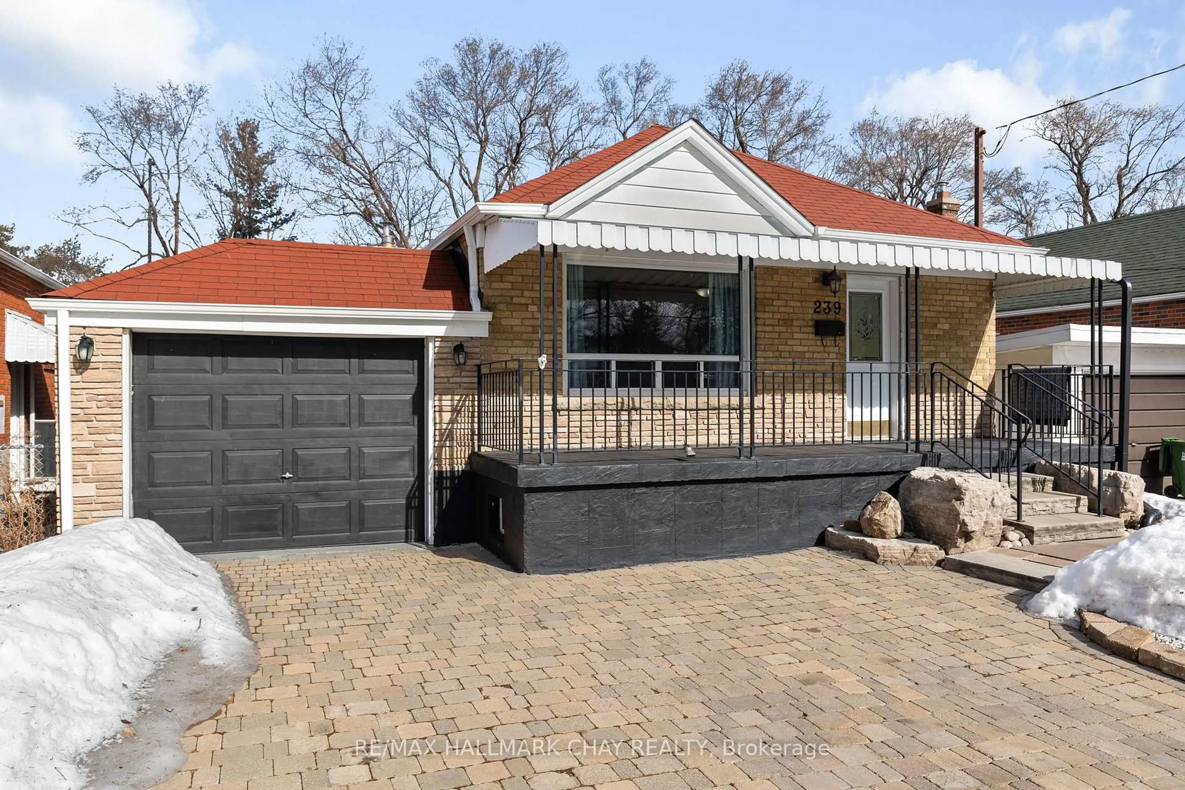 Home with brick exterior material, street for 239 Ellington Dr, Toronto Ontario M1R 3Y2