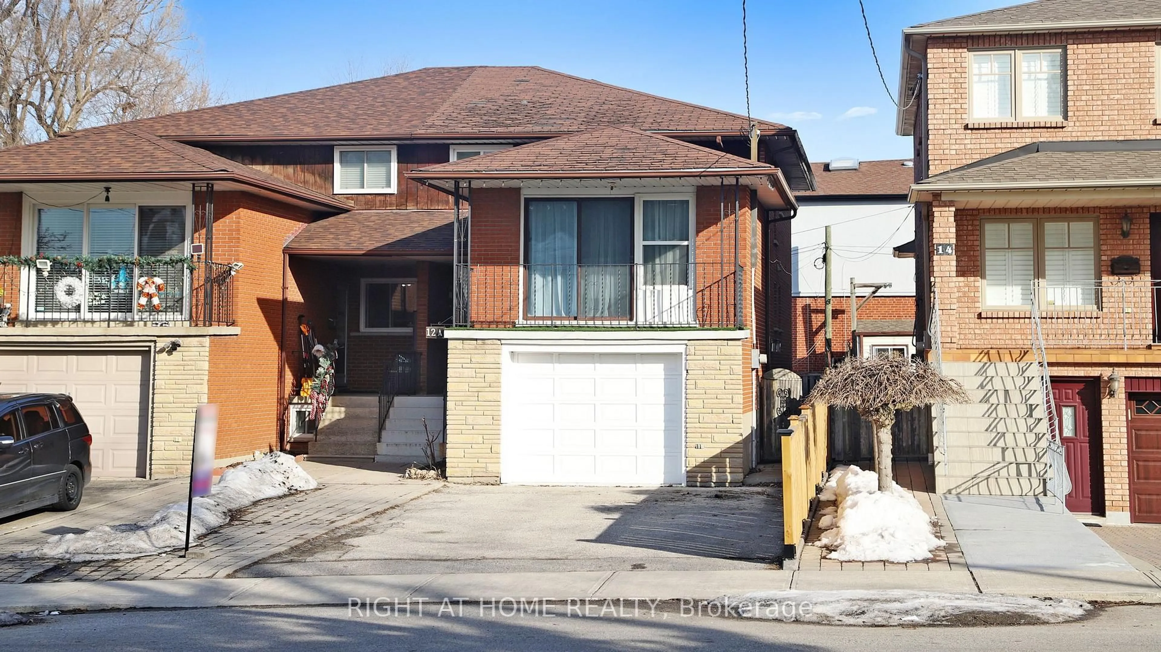 Home with brick exterior material, street for 12A Kenmore Ave, Toronto Ontario M1K 1B4