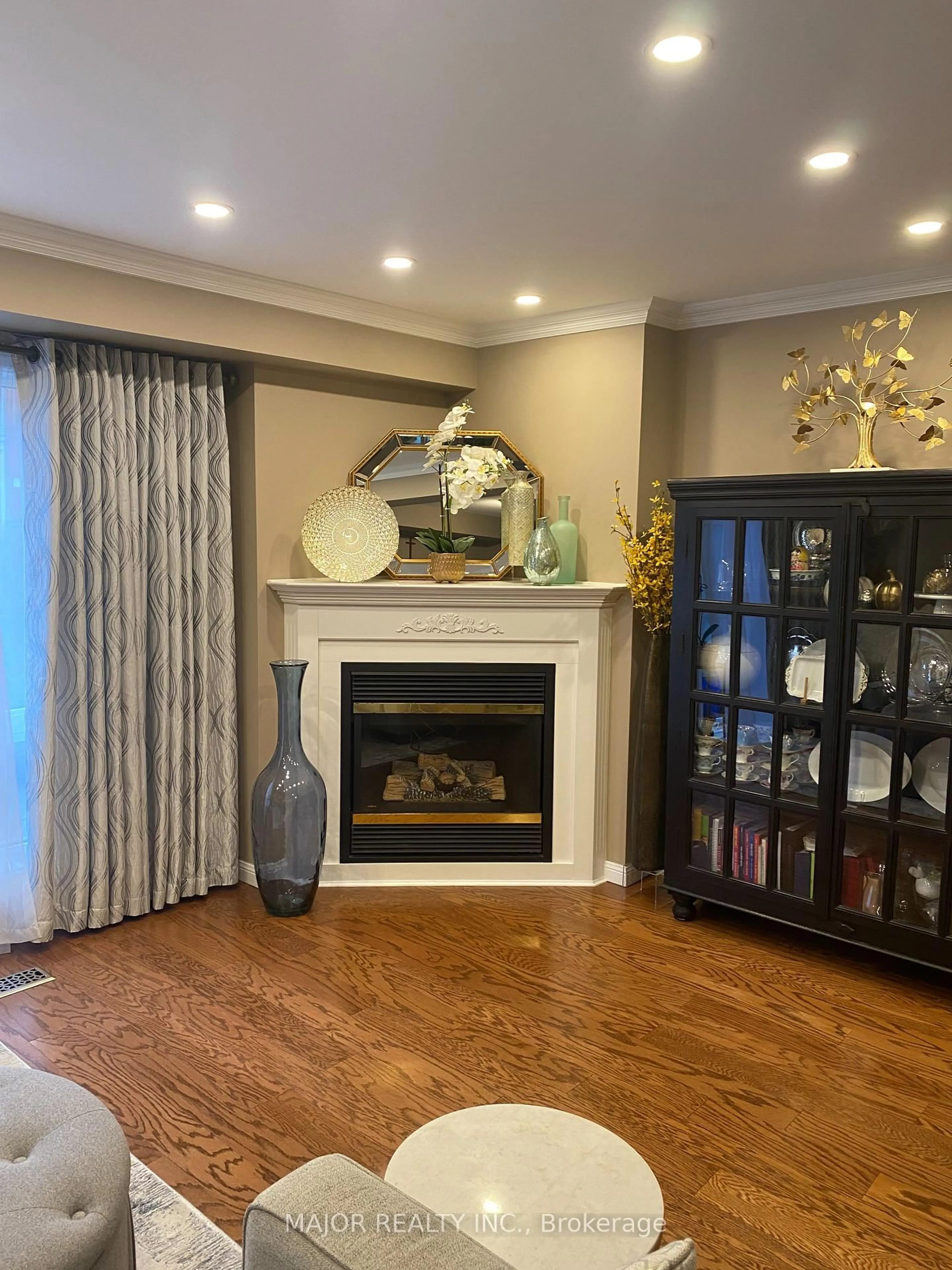 Living room with furniture, wood/laminate floor for 9 Torr Lane #36, Ajax Ontario L1S 7N1