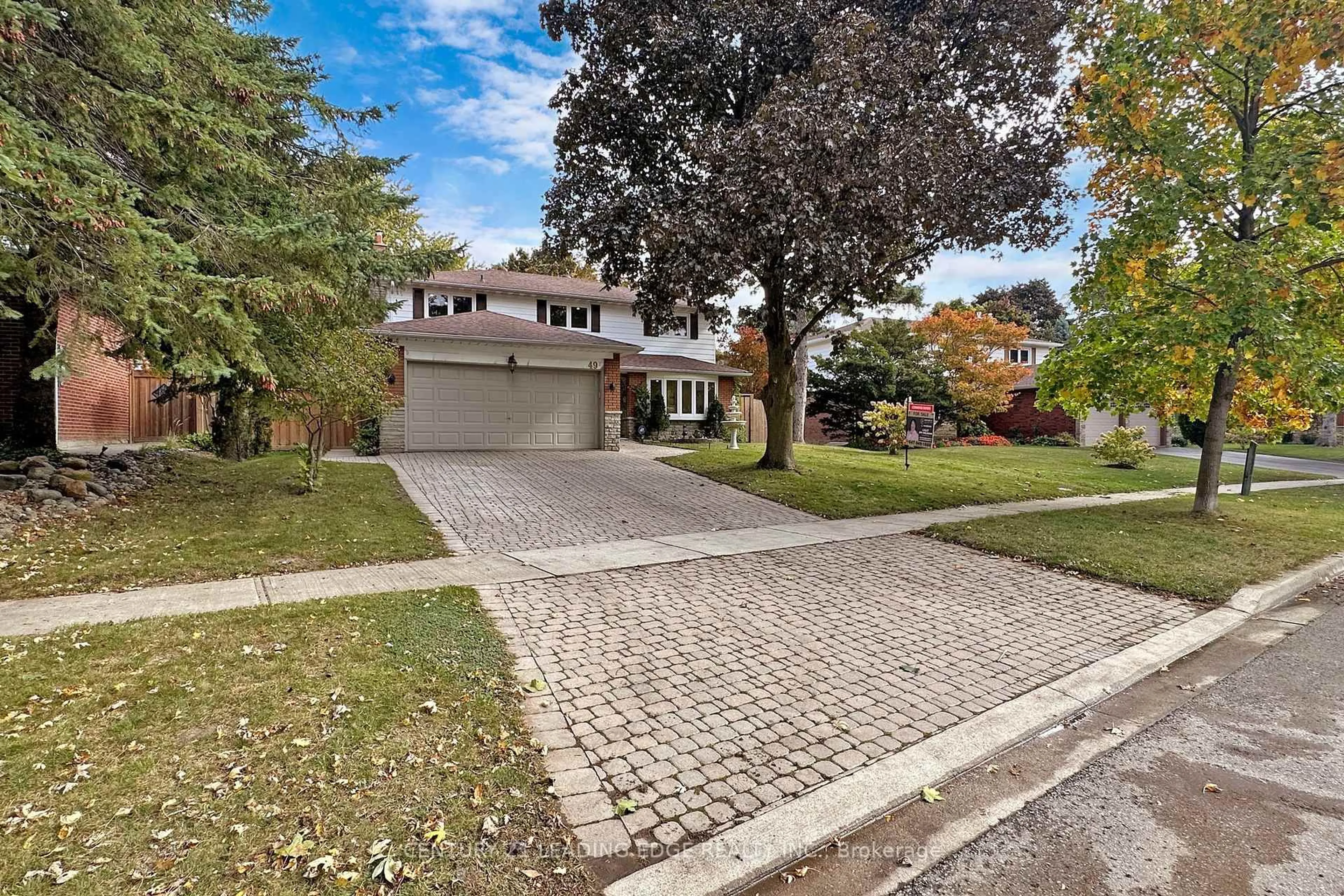 Home with brick exterior material, street for 49 Creekwood Dr, Toronto Ontario M1E 4L6