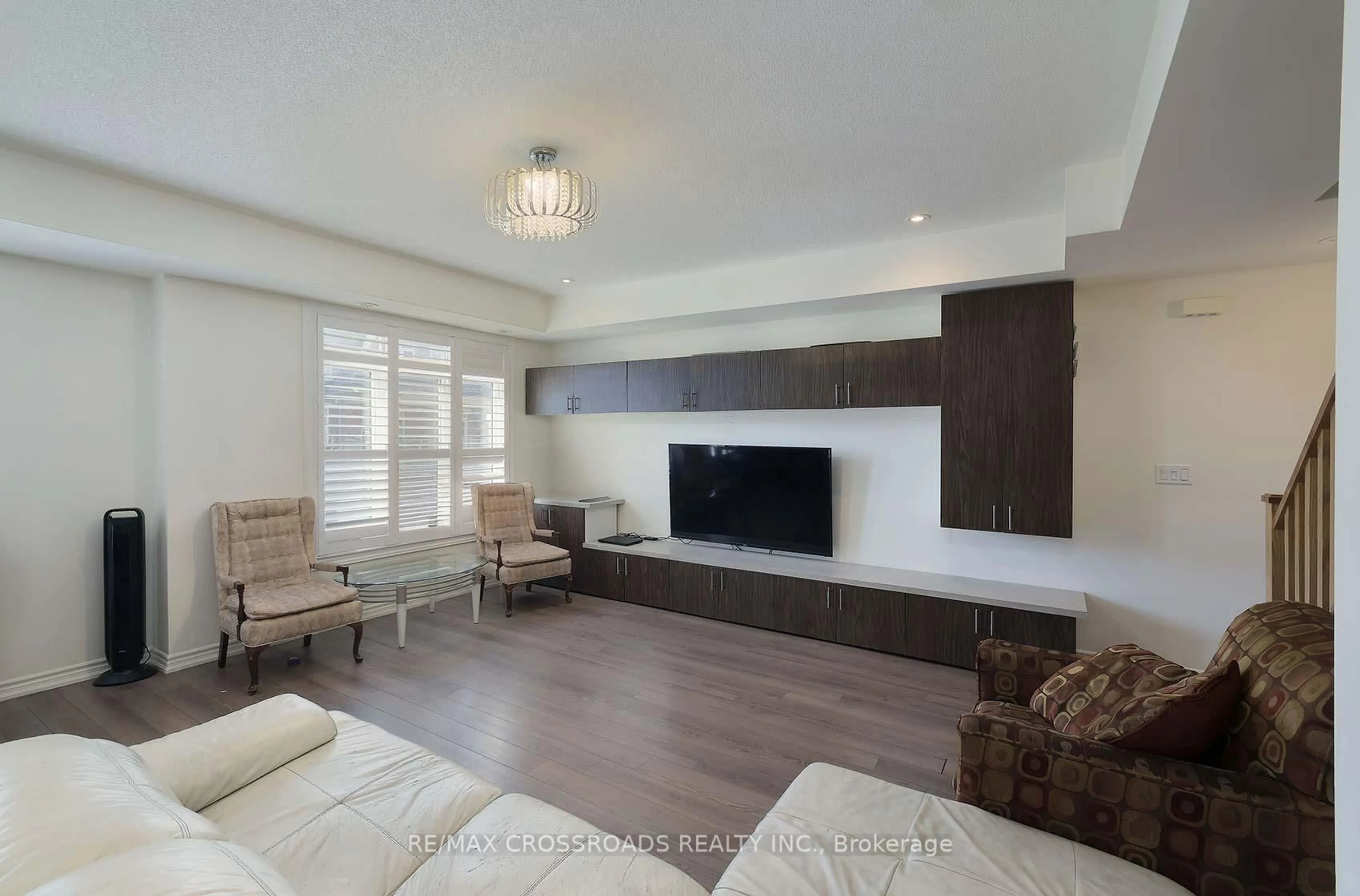 Living room with furniture, wood/laminate floor for 2726 William Jackson Dr #12, Pickering Ontario L1X 0E6