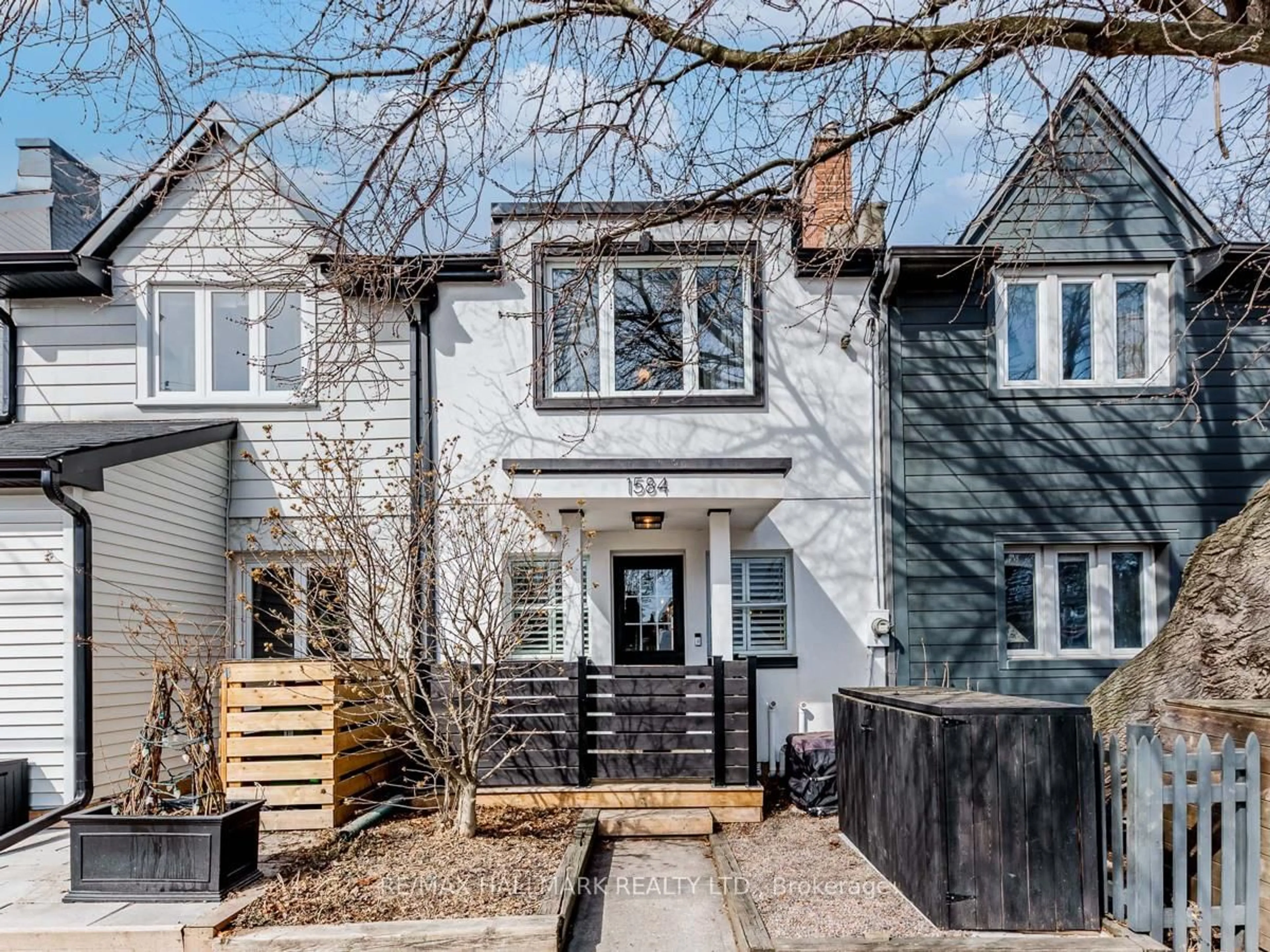 Home with brick exterior material, street for 1584 Dundas St, Toronto Ontario M4L 1K8
