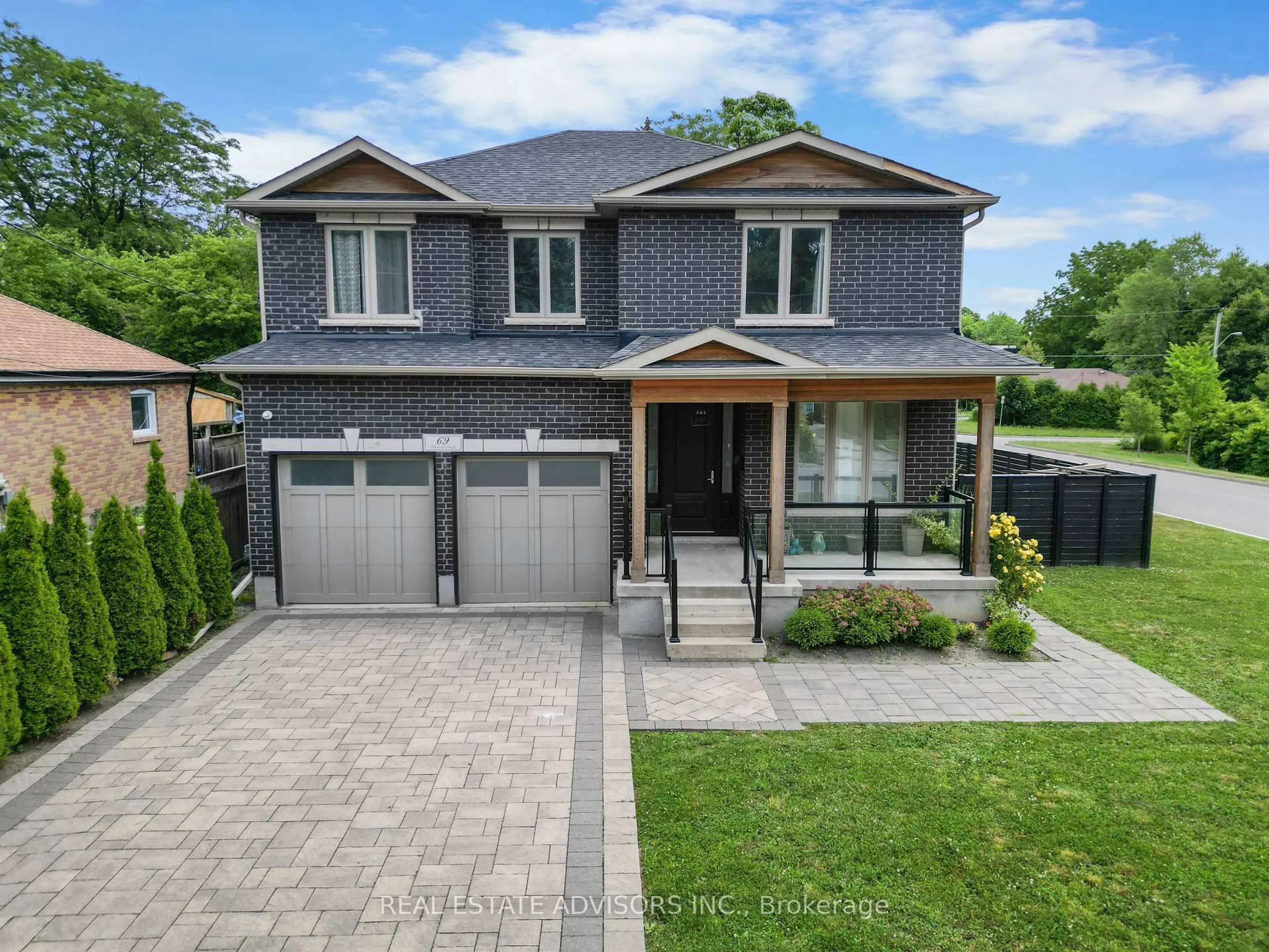 Home with brick exterior material, street for 69 Fenwood Hts, Toronto Ontario M1M 2W1