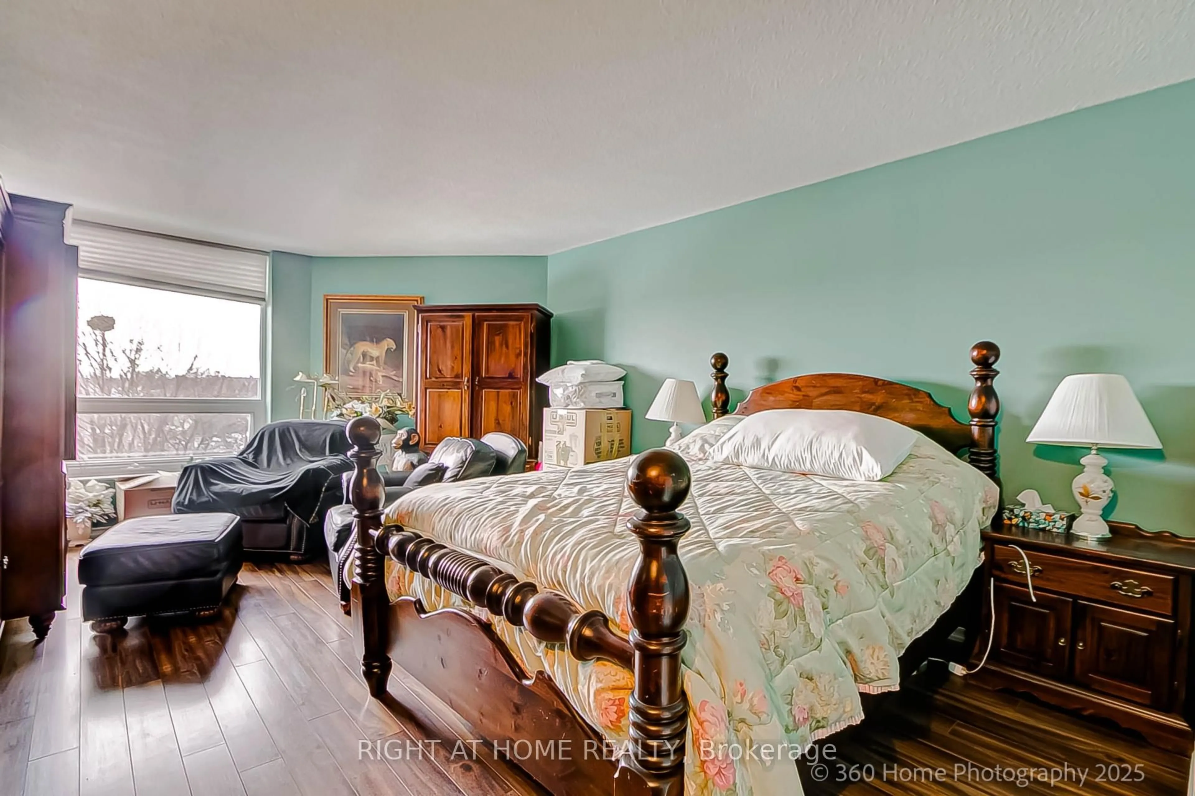 Bedroom with bed, wood/laminate floor for 700 Wilson Rd #506, Oshawa Ontario L1G 7T5