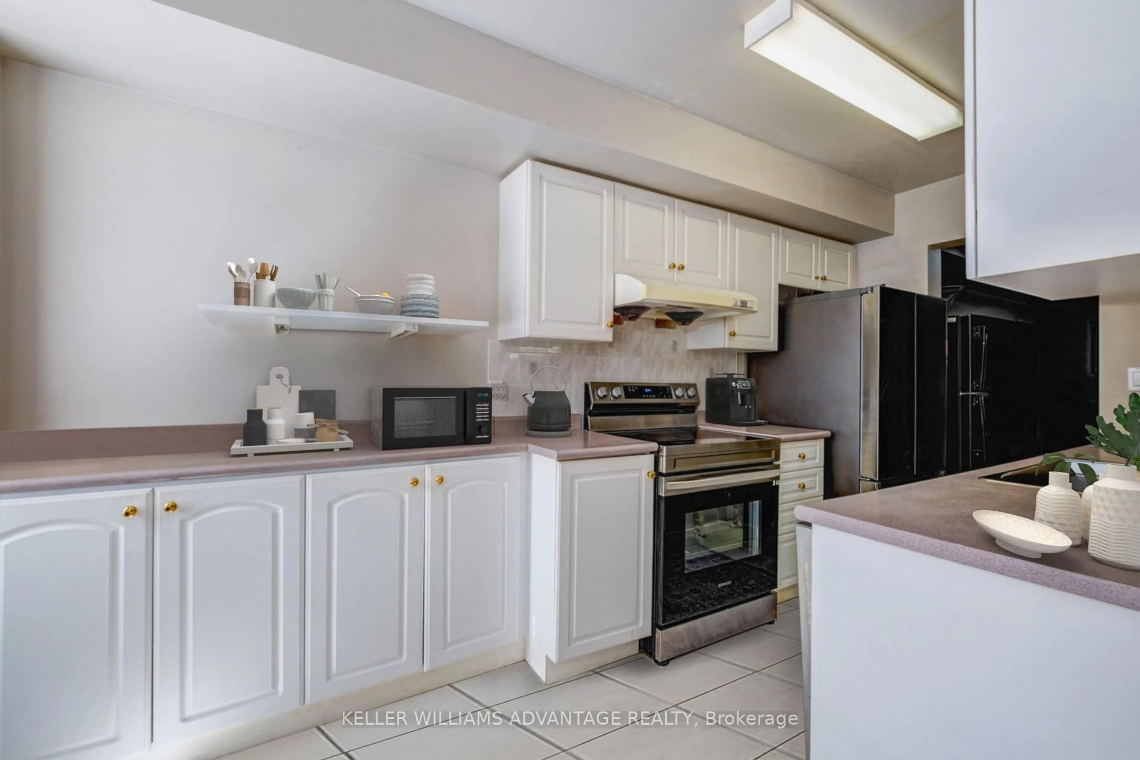 Standard kitchen, ceramic/tile floor for 29 Rosebank Dr #503, Toronto Ontario M1B 5Y7