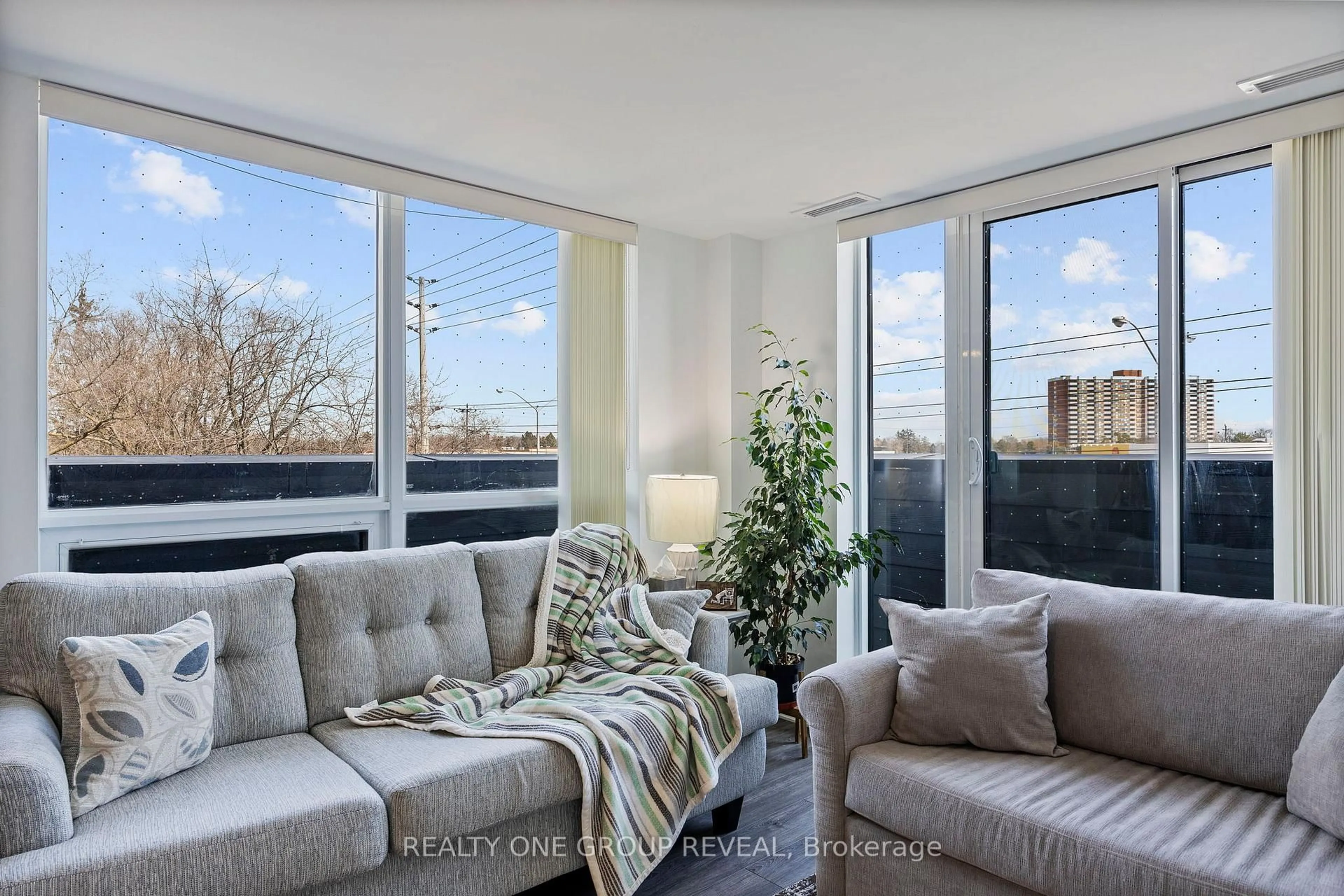 Living room with furniture, unknown for 1 Falaise Rd #313, Toronto Ontario M1E 0B9