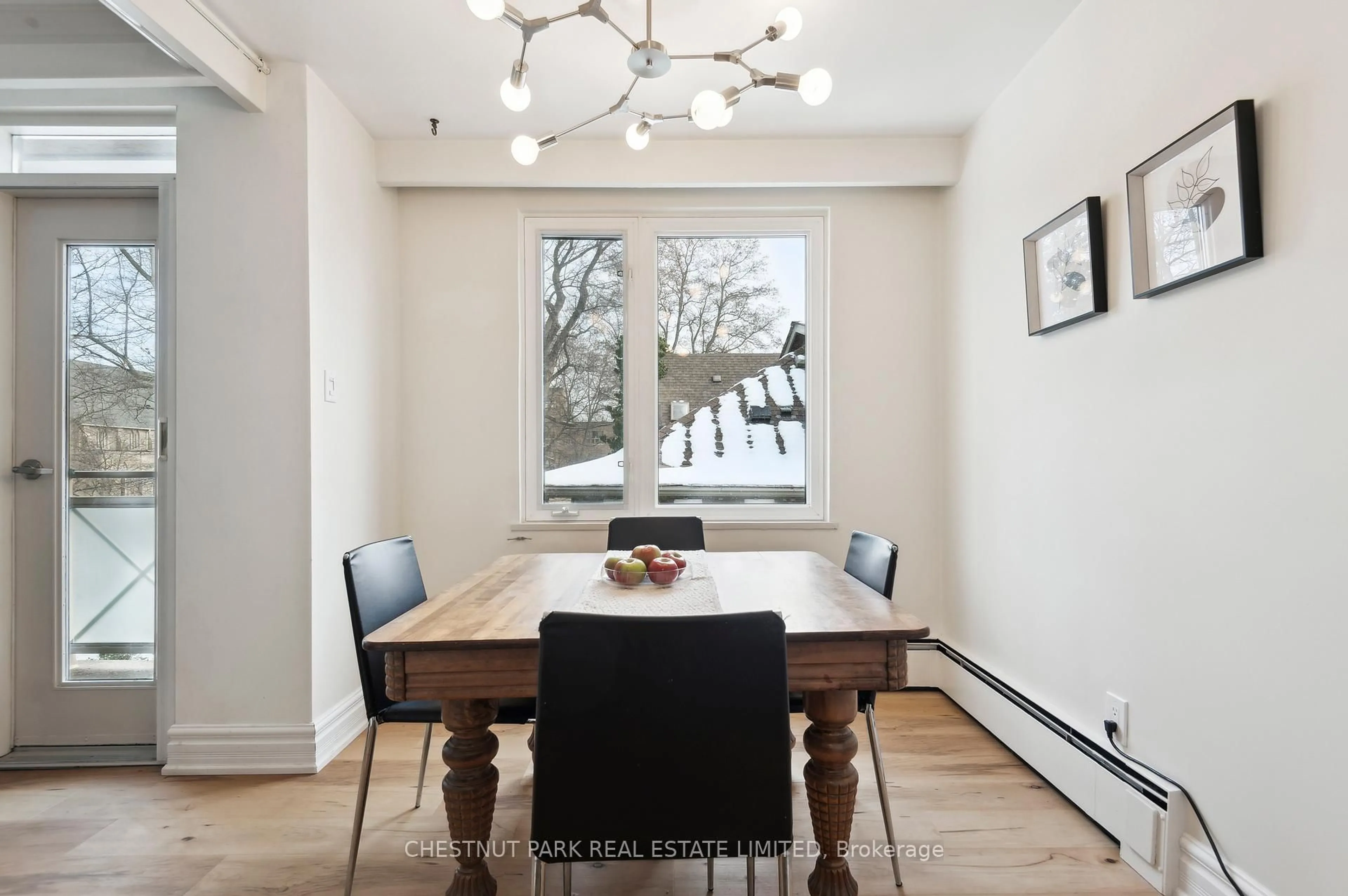 Dining room, wood/laminate floor for 21 Benlamond Ave #8, Toronto Ontario M4E 1Y8