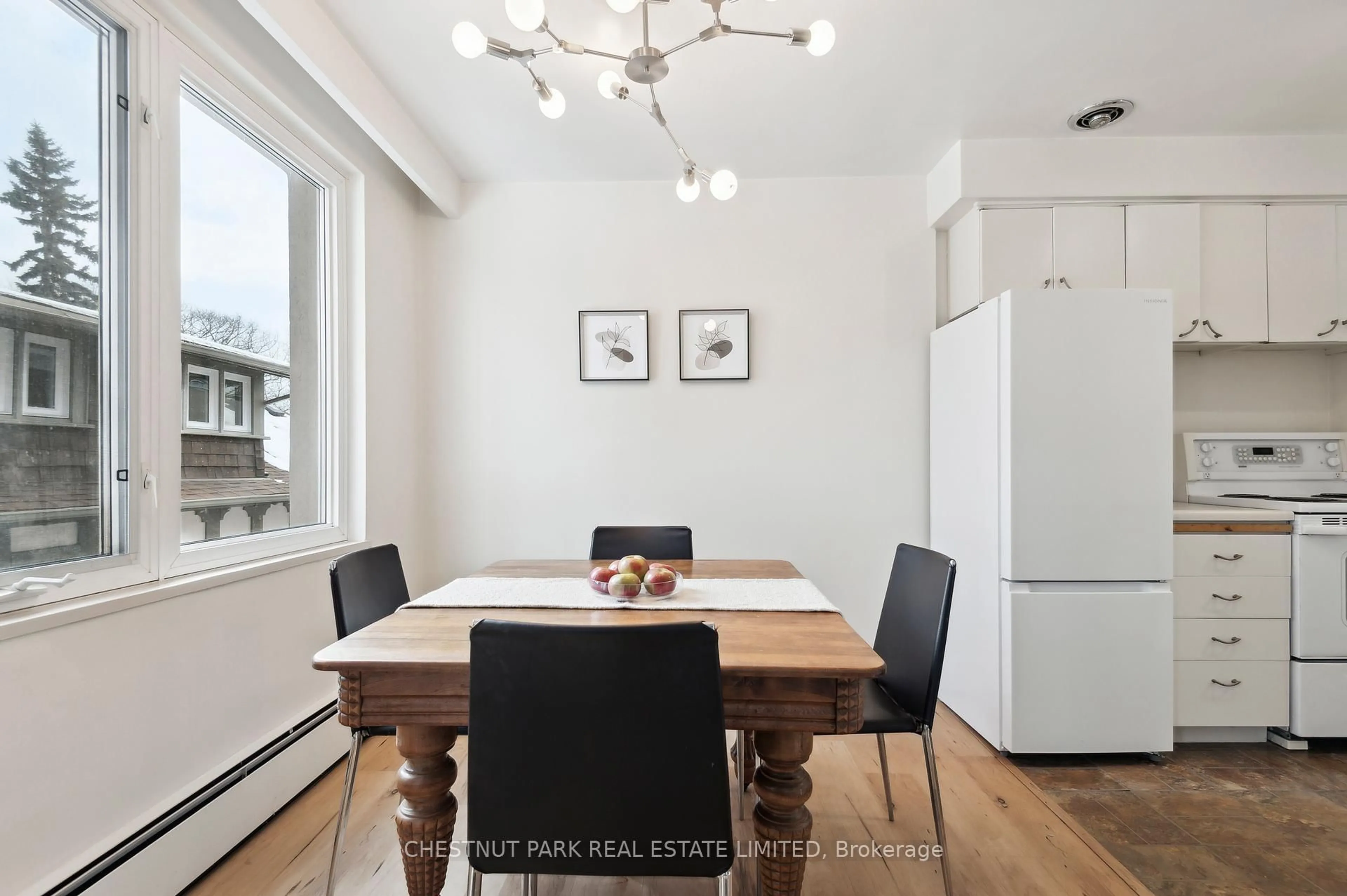 Dining room, wood/laminate floor for 21 Benlamond Ave #8, Toronto Ontario M4E 1Y8