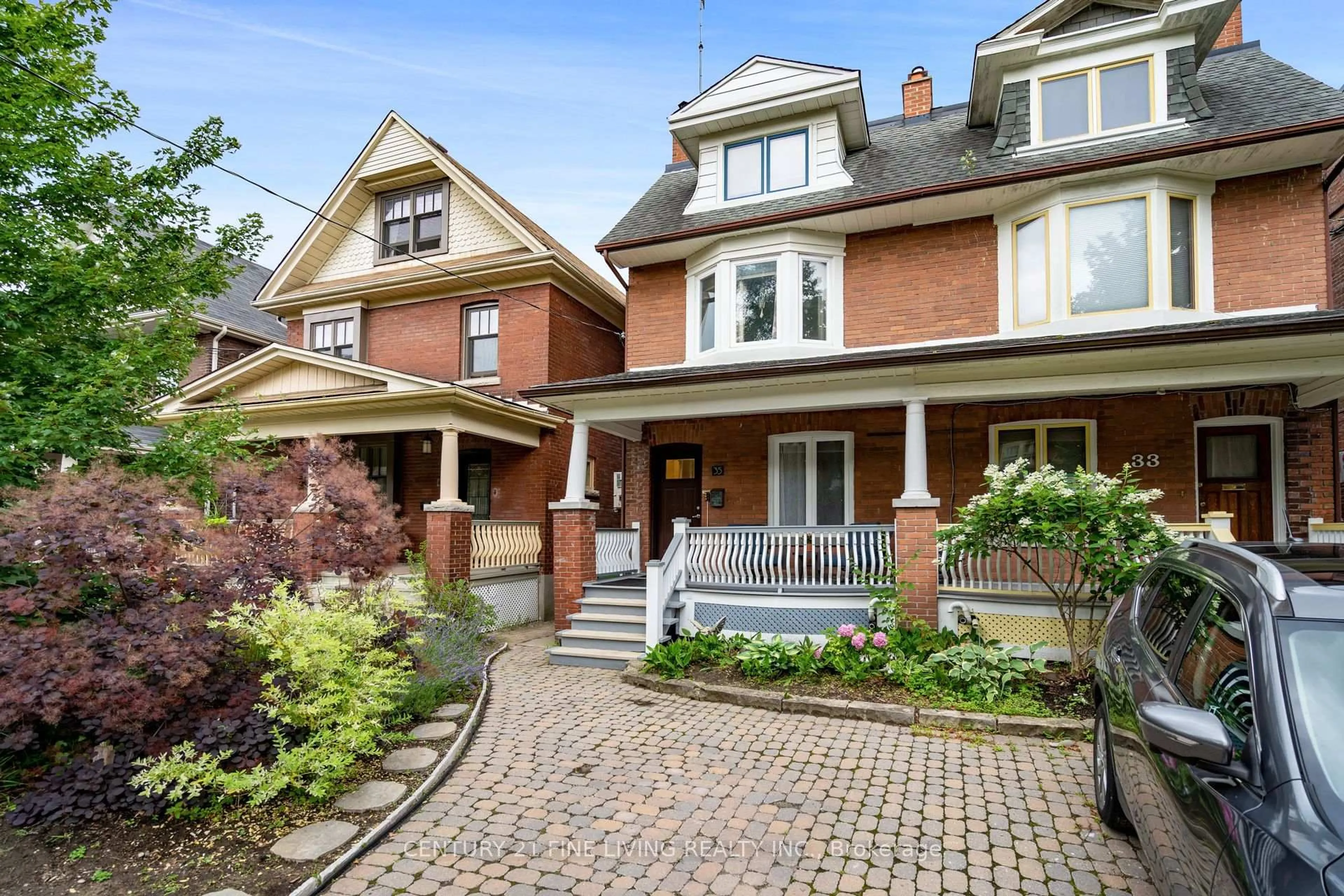 Home with brick exterior material, street for 35 Columbine Ave, Toronto Ontario M4L 1P4