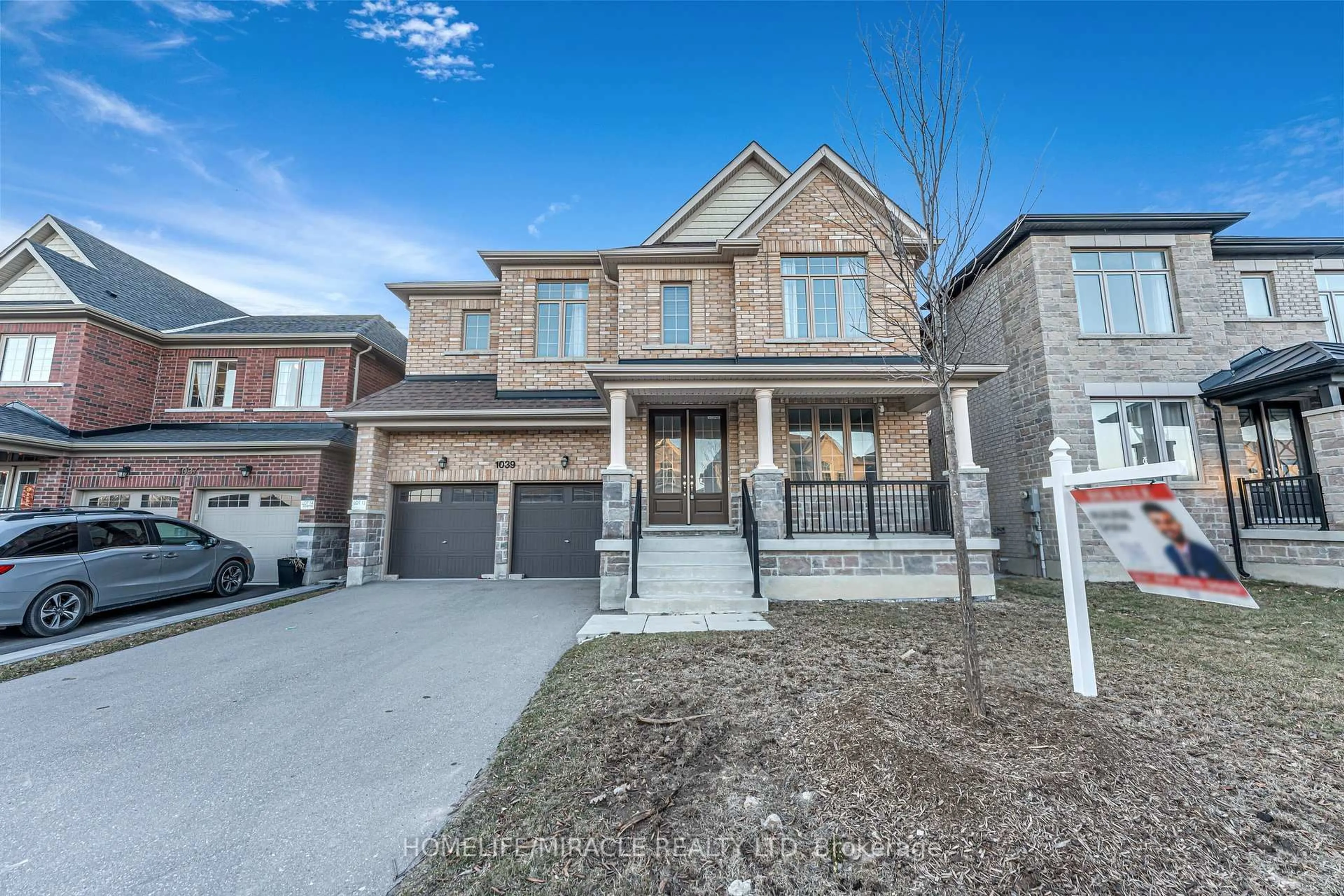 Home with brick exterior material, street for 1039 Kingpeak Cres, Pickering Ontario L1X 0H3