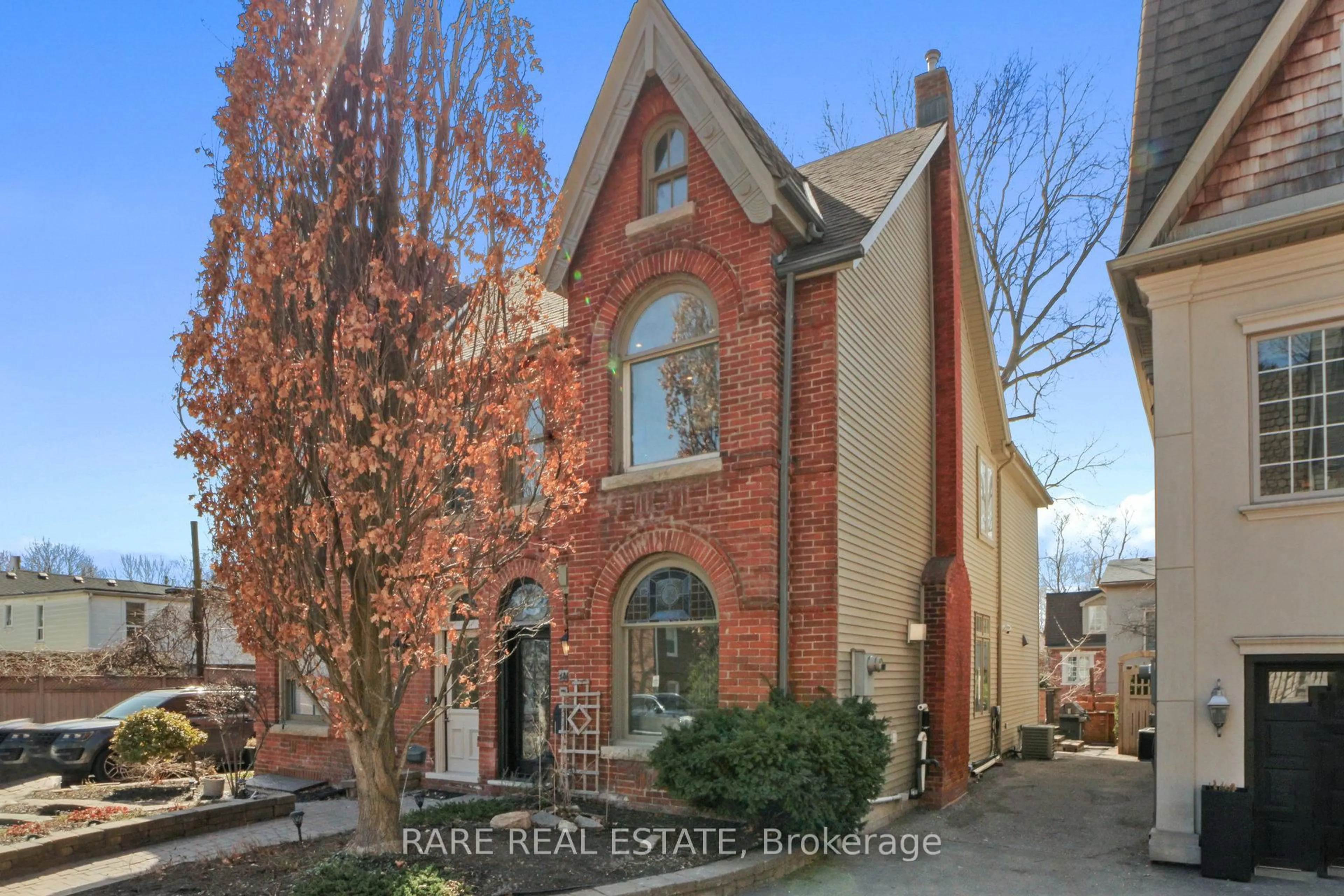 Home with brick exterior material, street for 130 Edgewood Ave, Toronto Ontario M4L 3H3