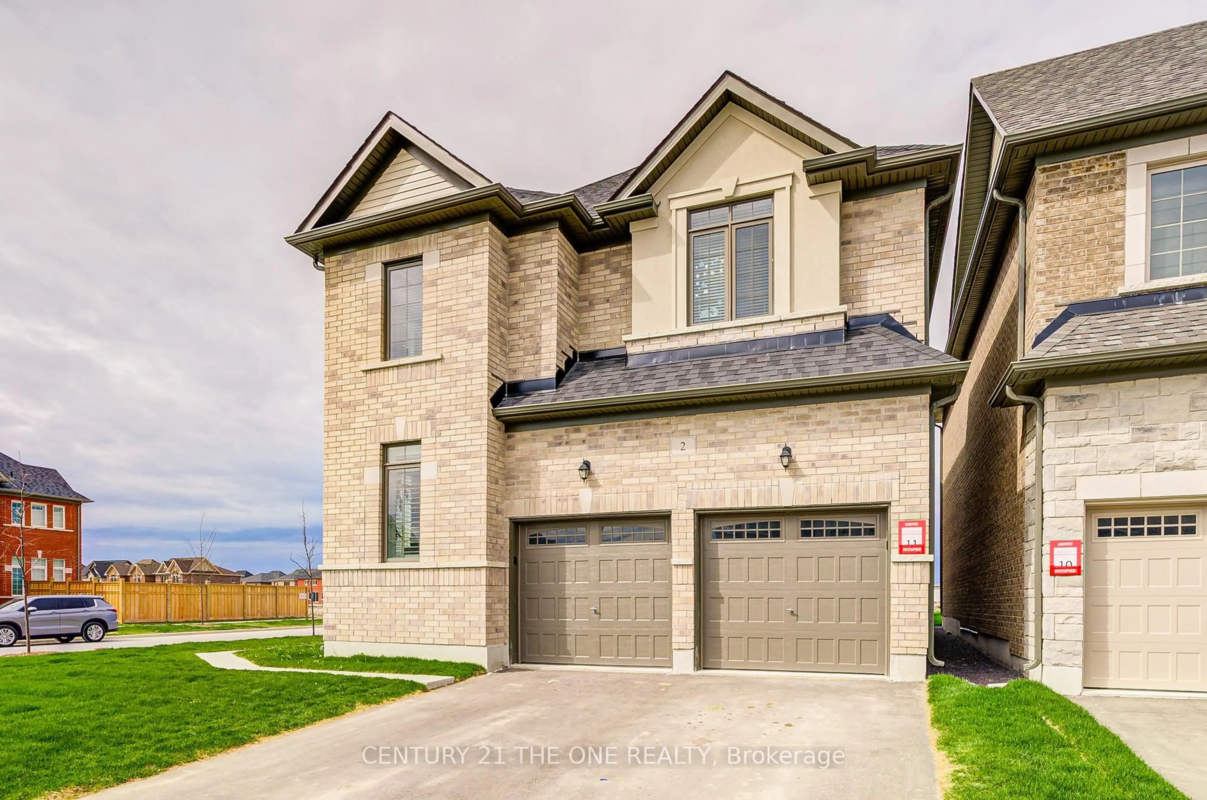 Home with brick exterior material, street for 2 Wesley Brooks St, Clarington Ontario L1B 0W4
