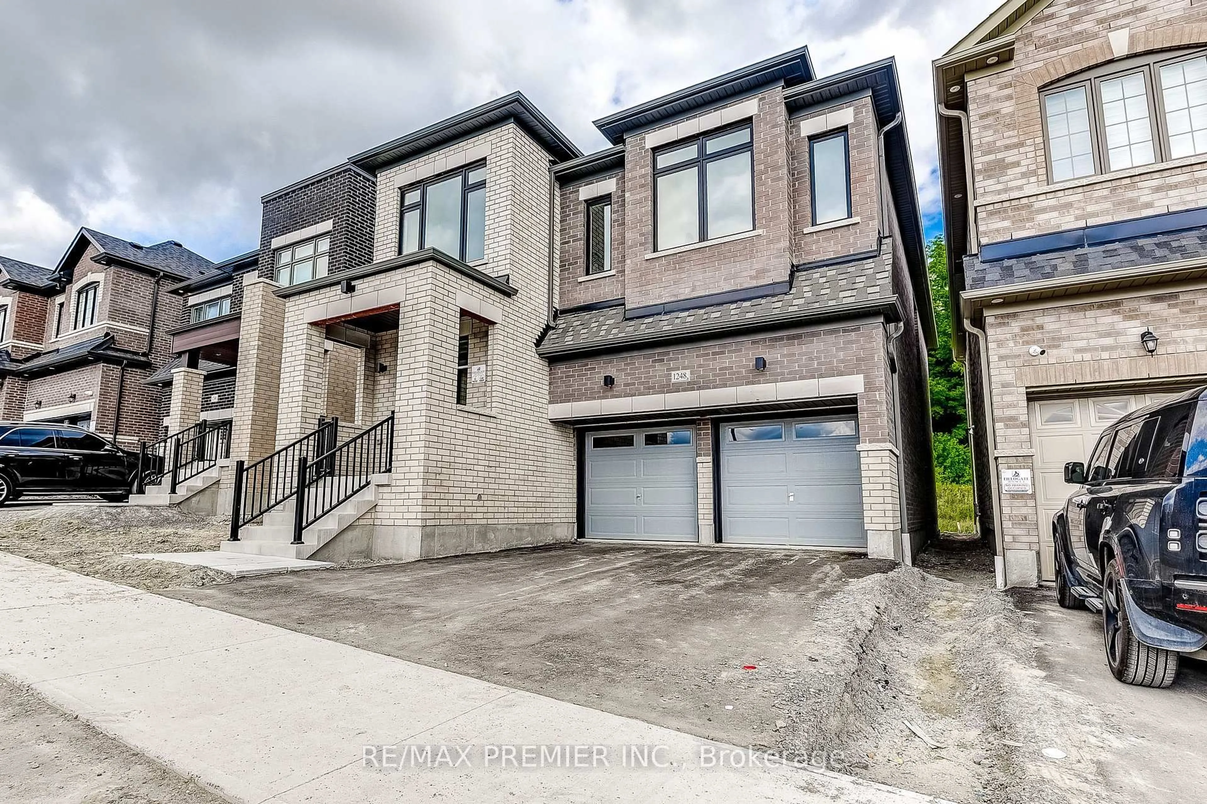Home with brick exterior material, street for 1248 Talisman Manr, Pickering Ontario L1X 0R8