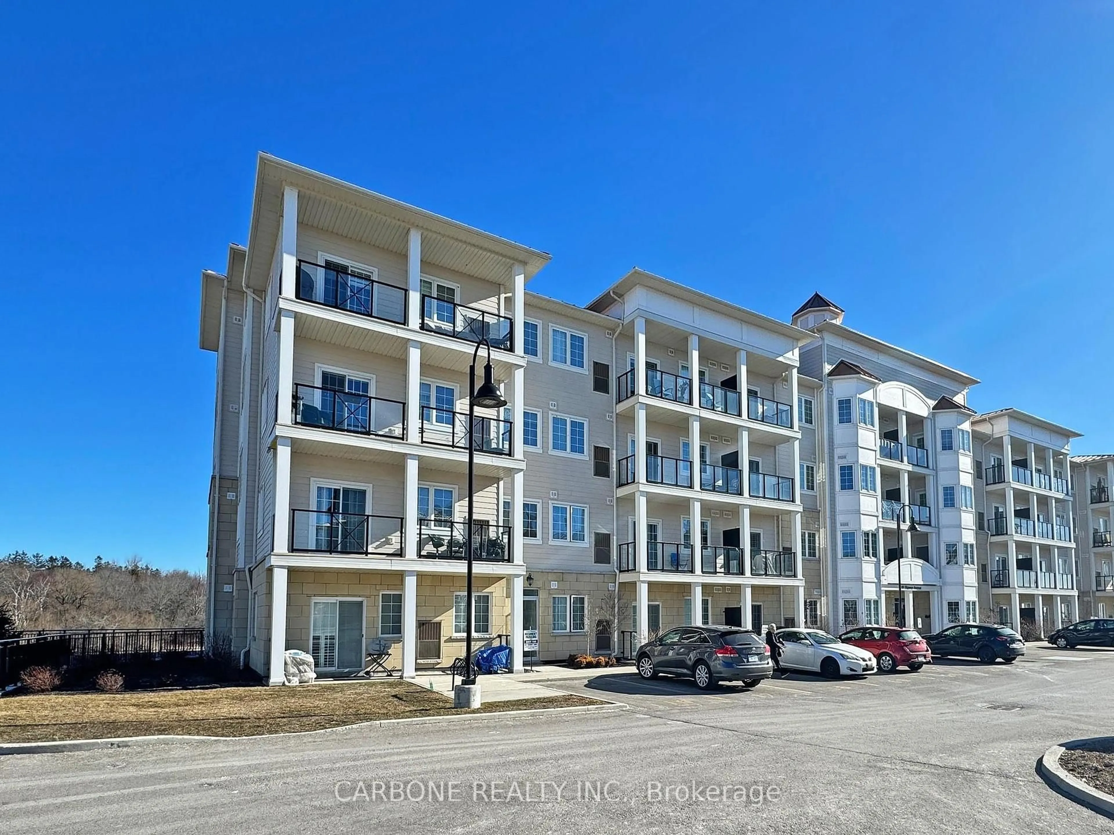 A pic from outside/outdoor area/front of a property/back of a property/a pic from drone, unknown for 80 Shipway Ave #102, Clarington Ontario L1B 0B6