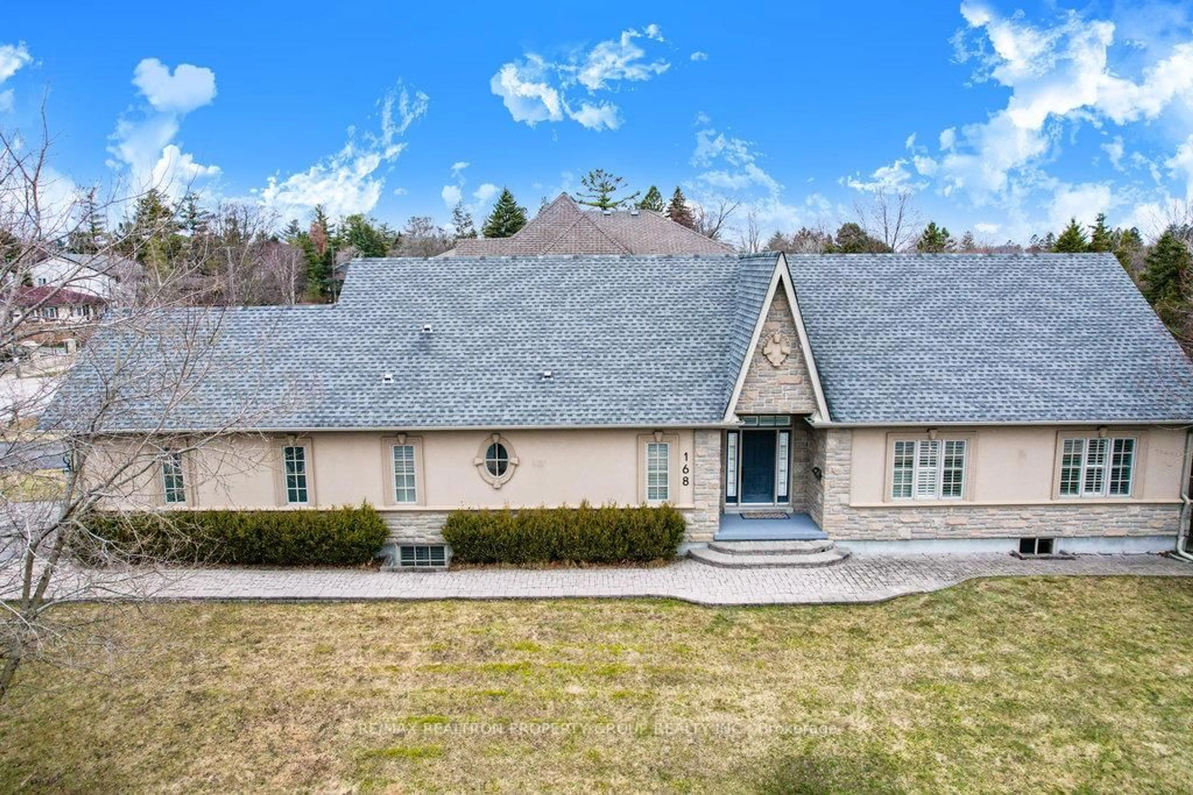 A pic from outside/outdoor area/front of a property/back of a property/a pic from drone, mountain view for 168 Twyn Rivers Dr, Pickering Ontario L1V 1E2