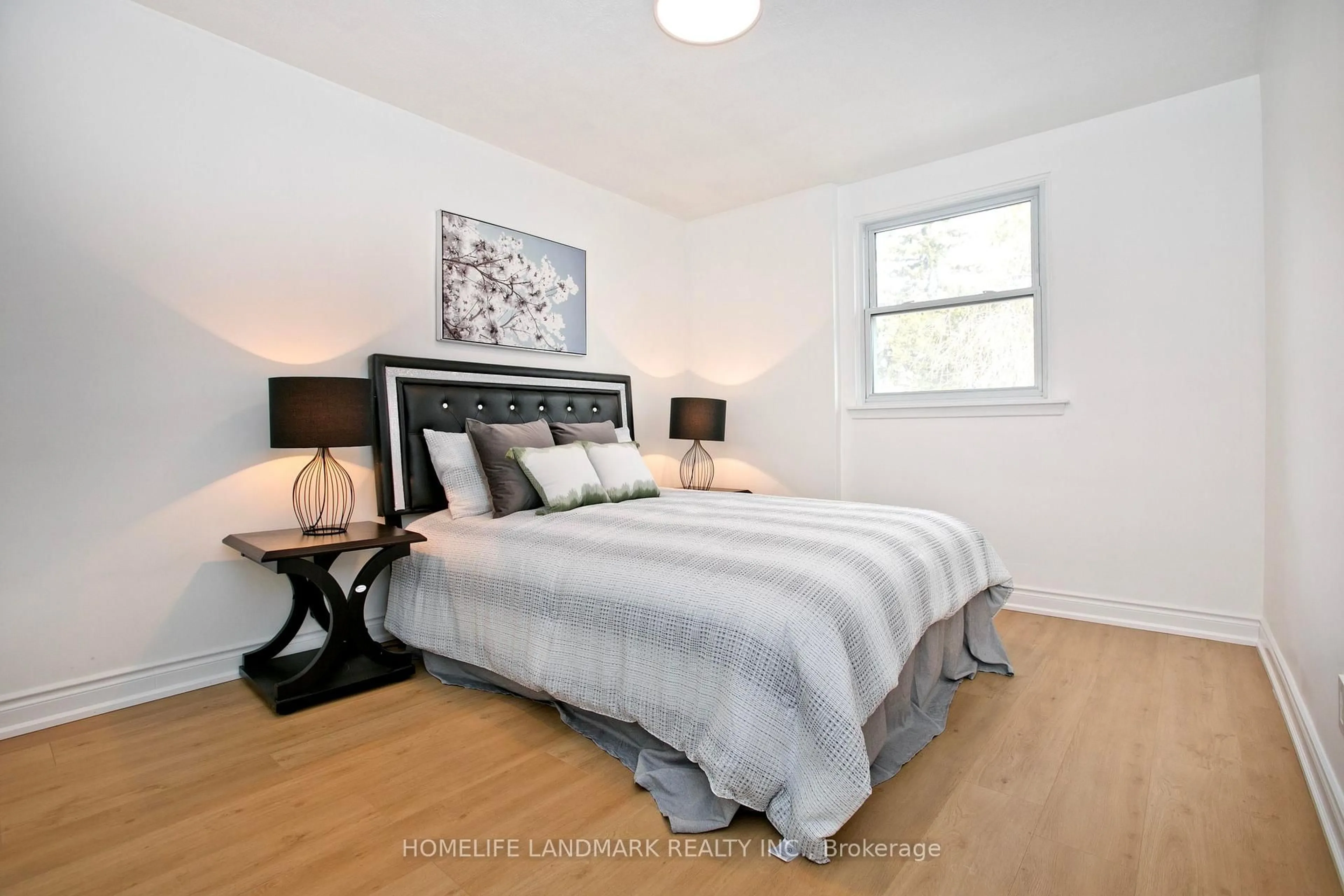 Bedroom with bed, wood/laminate floor for 56 Blaisdale Rd, Toronto Ontario M1P 1V8