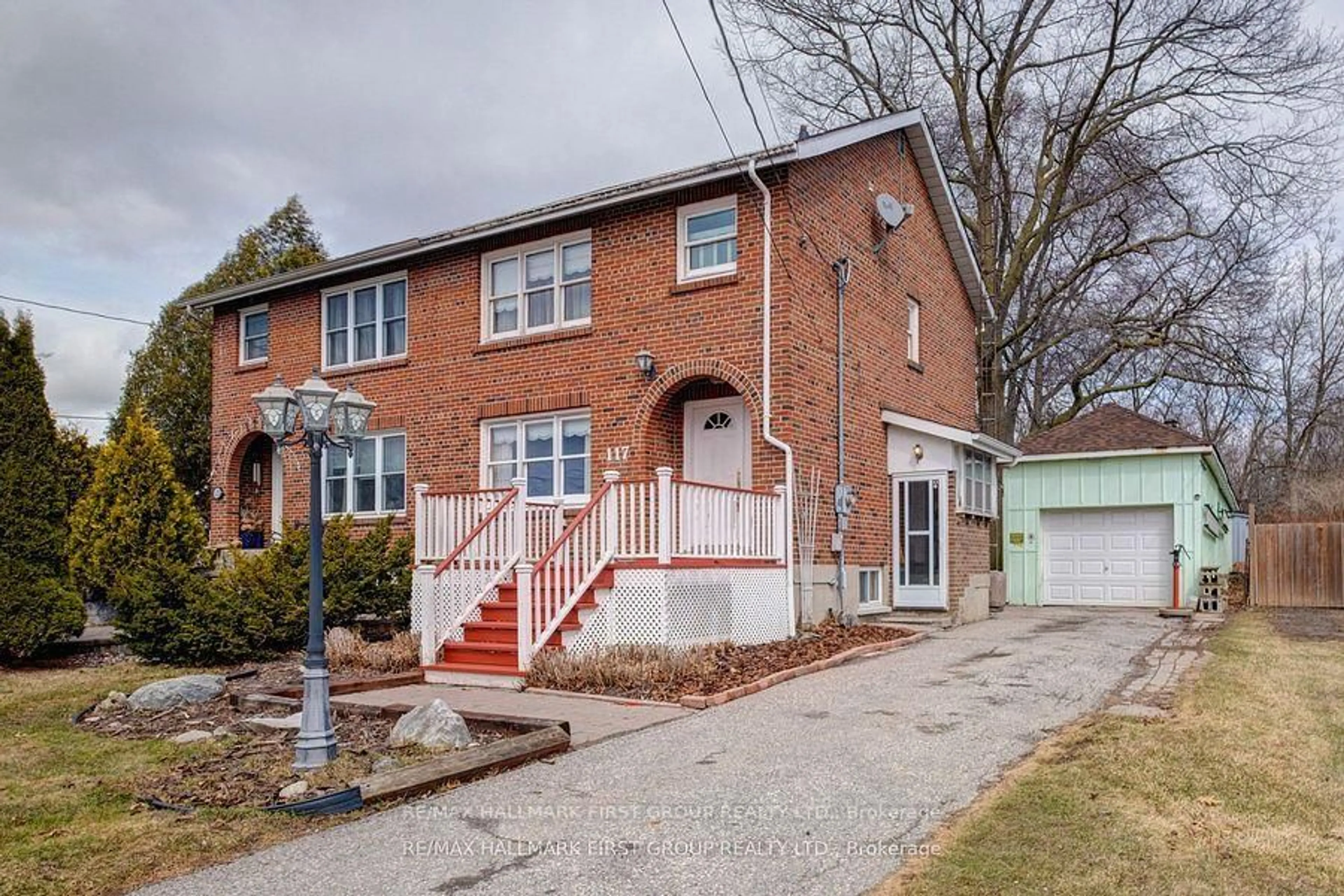 Home with brick exterior material, street for 117 Halls Rd, Whitby Ontario L1P 1Y8