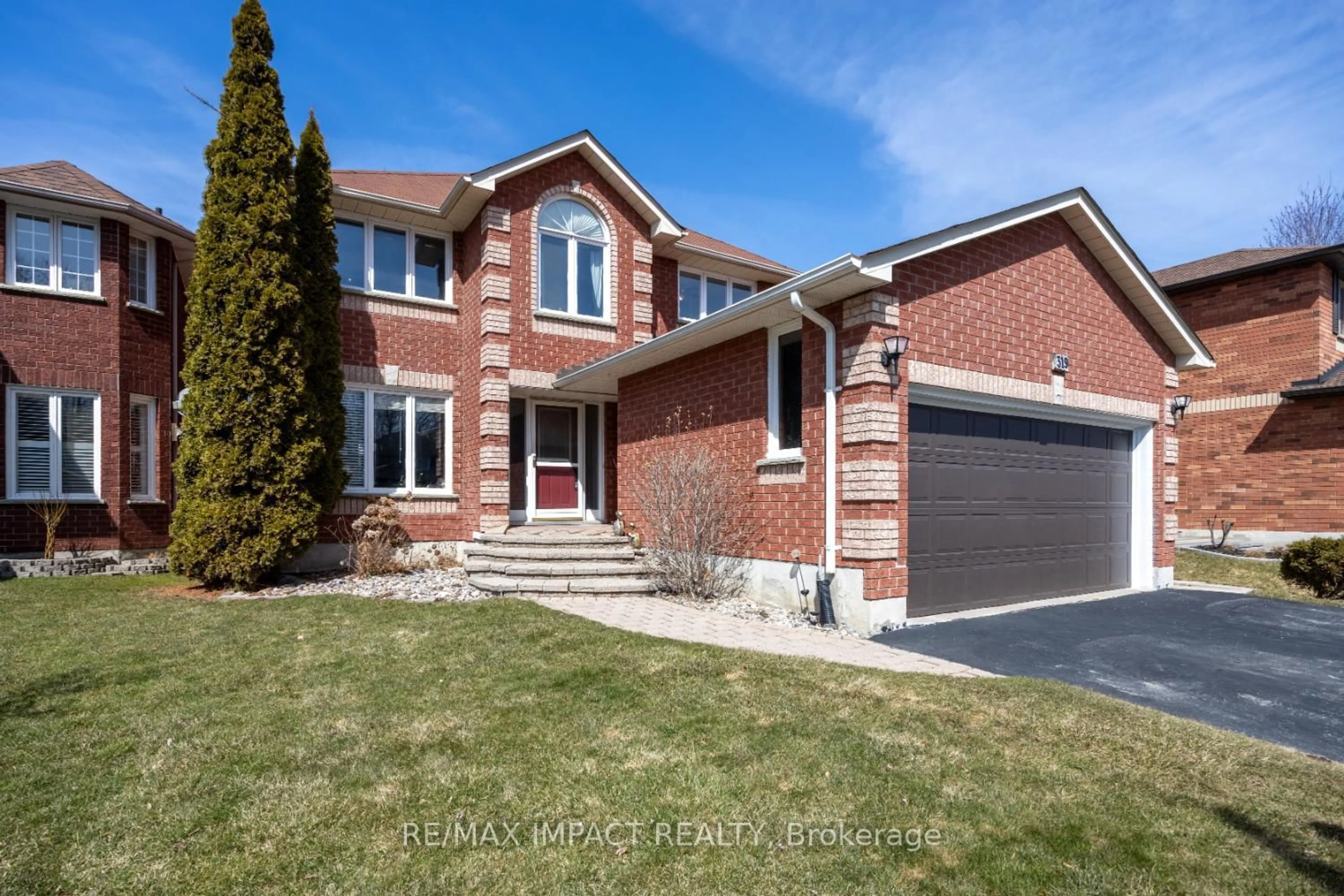 Home with brick exterior material, street for 319 Sandringham Dr, Clarington Ontario L1E 3A7