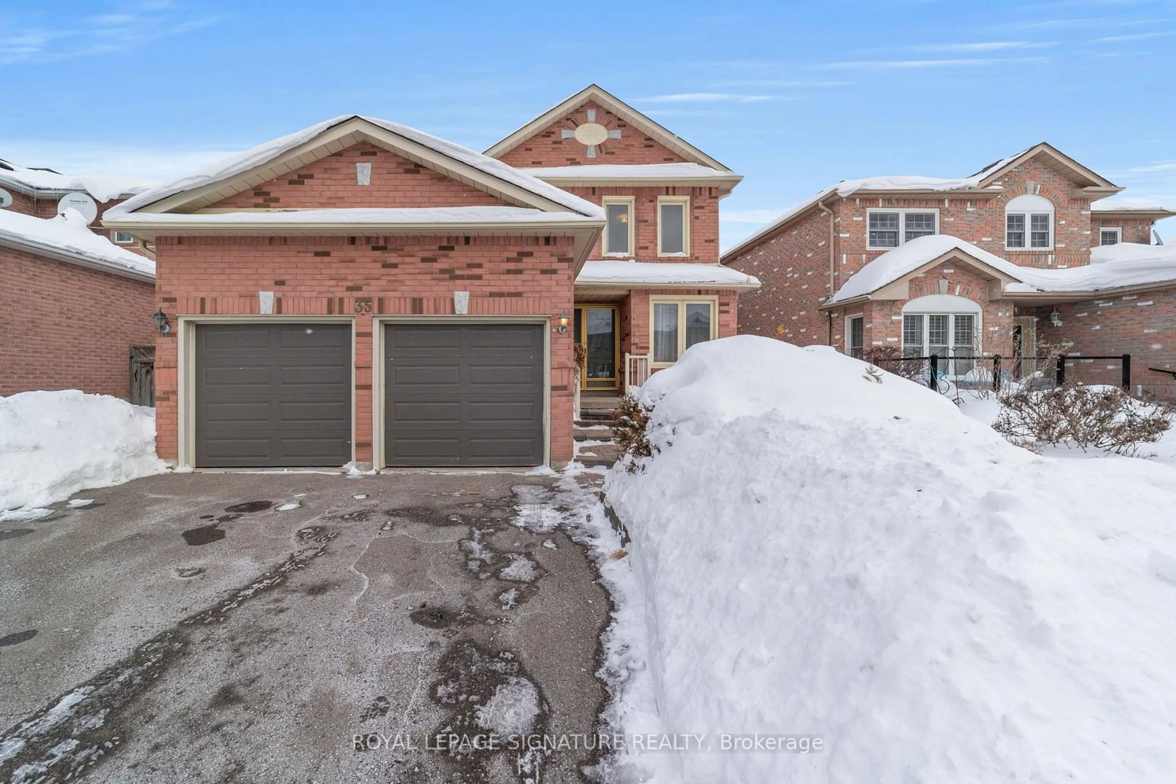 Home with brick exterior material, street for 35 Valleywood Dr, Whitby Ontario L1R 2J6