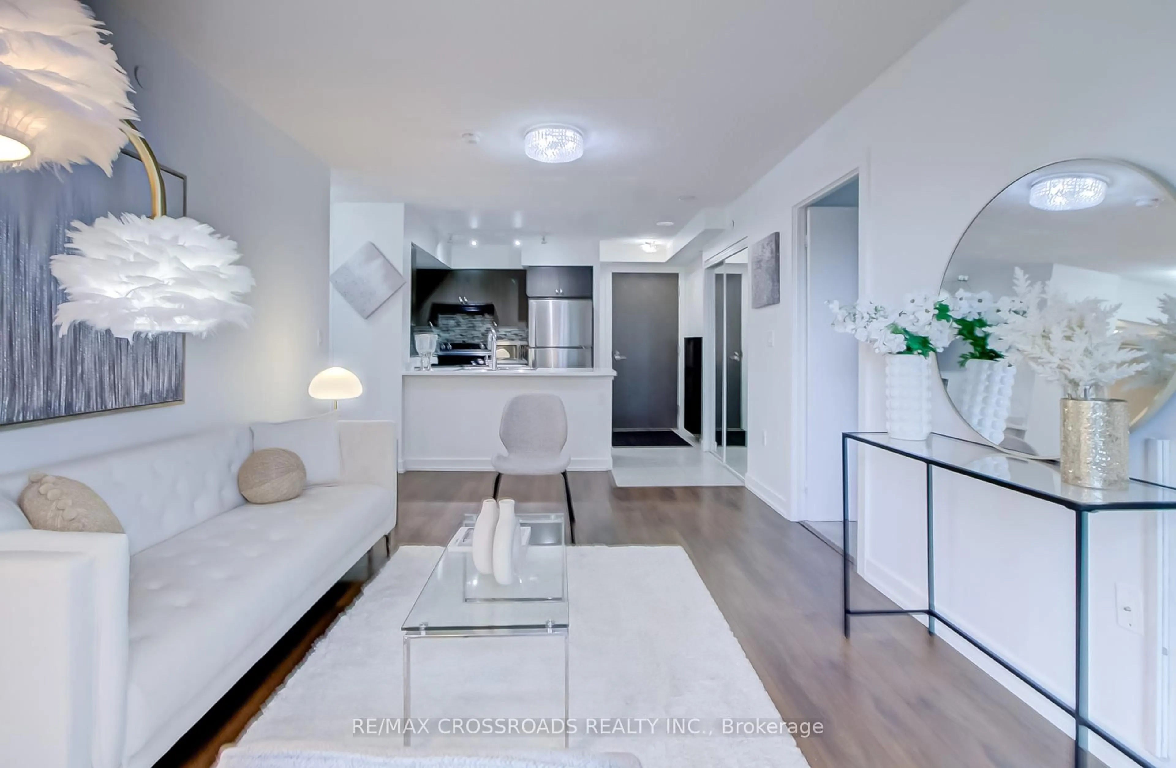 Living room with furniture, unknown for 1346 Danforth Rd #214, Toronto Ontario M1J 0A9