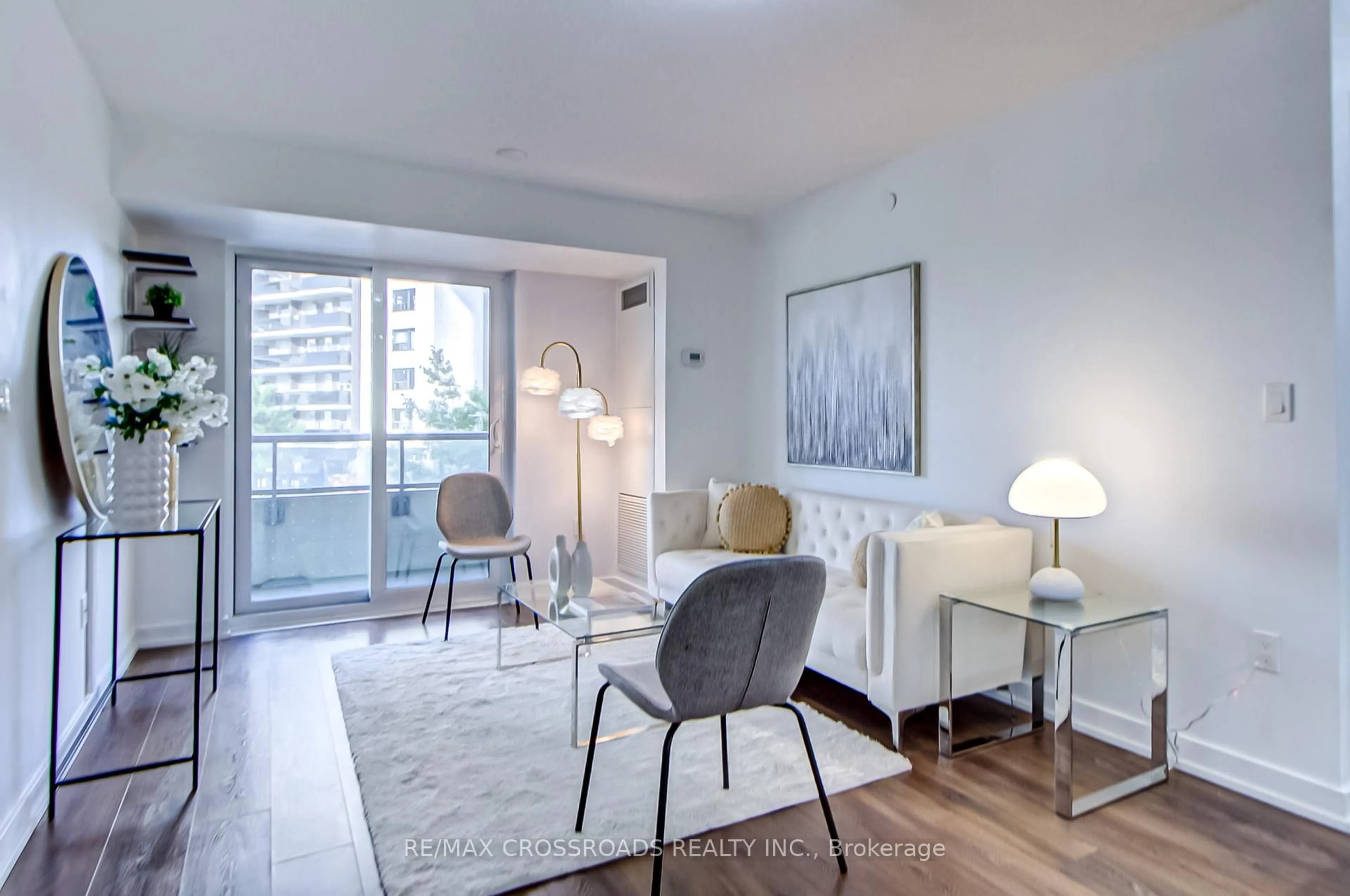 Living room with furniture, unknown for 1346 Danforth Rd #214, Toronto Ontario M1J 0A9