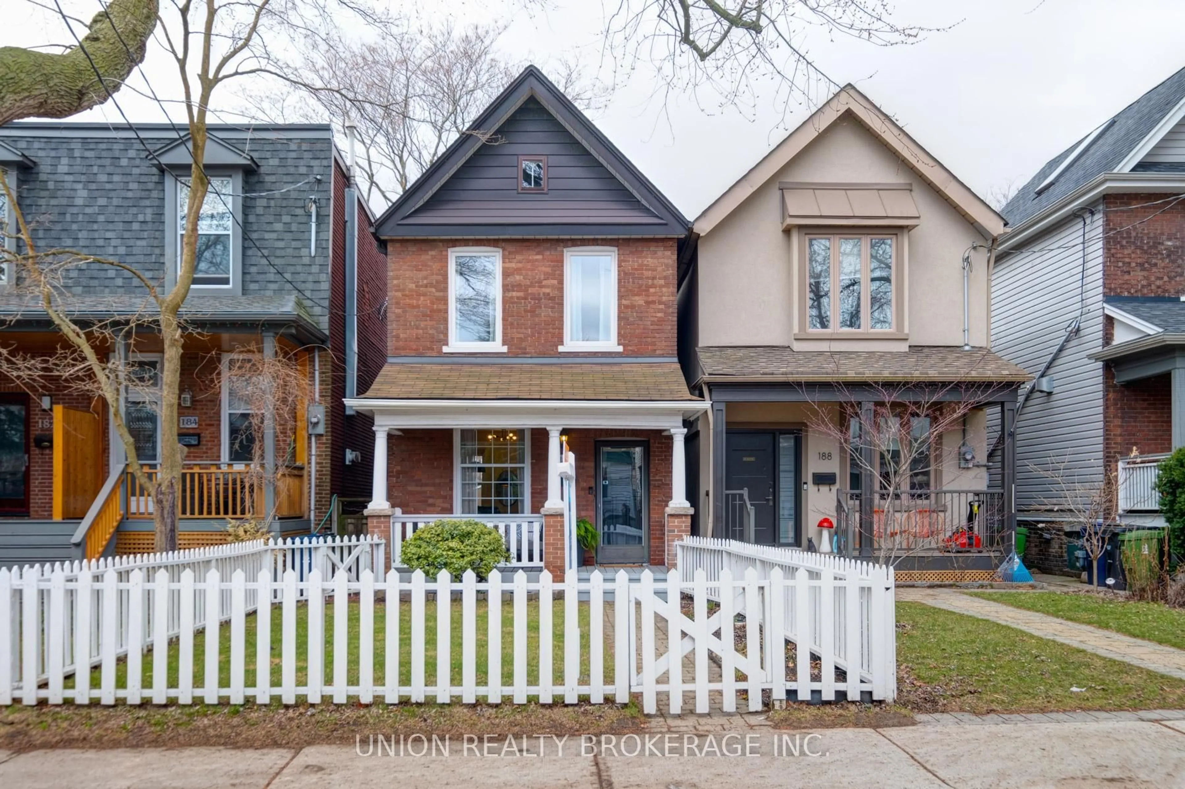 Home with brick exterior material, street for 186 Leslie St, Toronto Ontario M4M 3C7