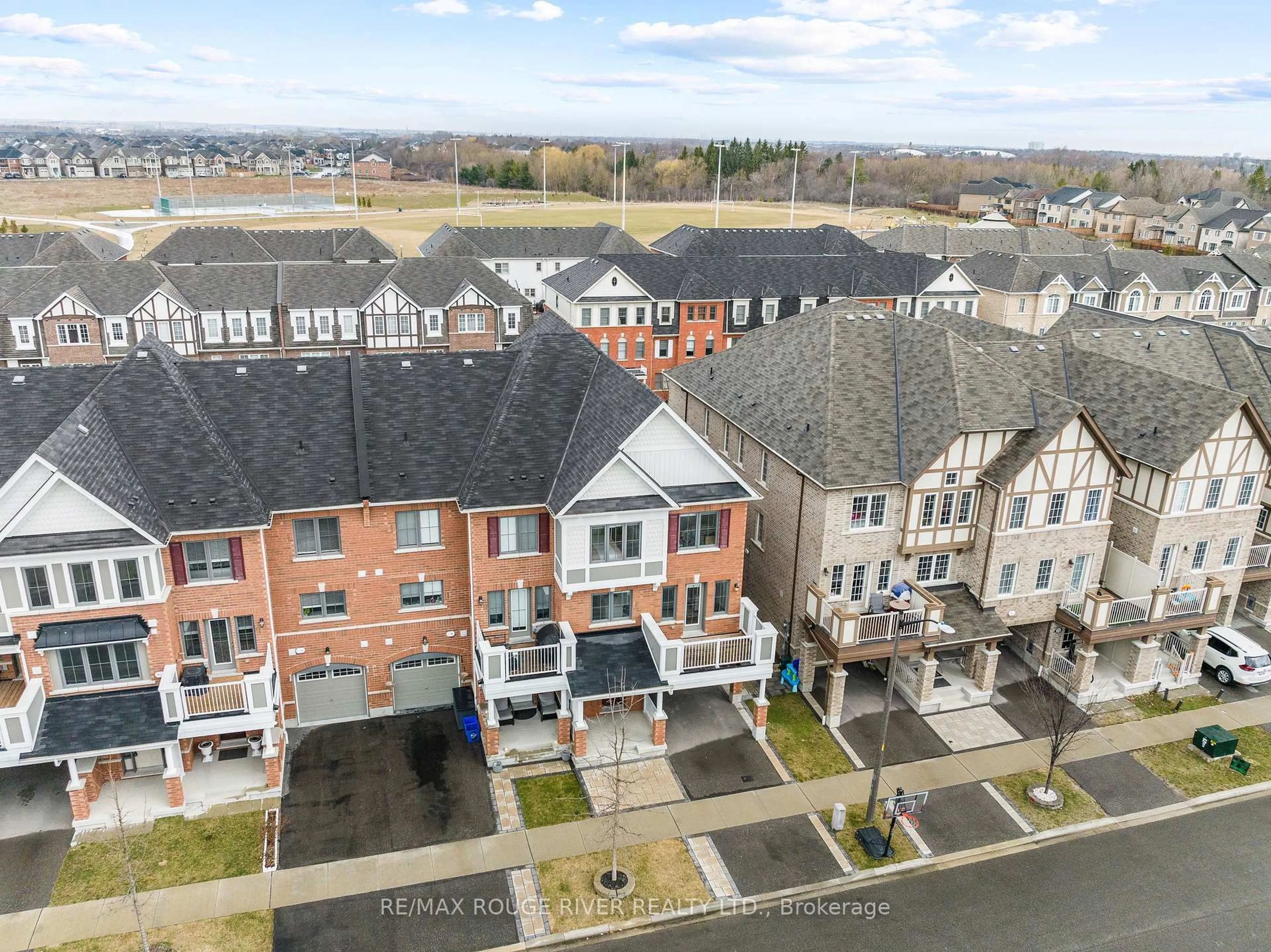 A pic from outside/outdoor area/front of a property/back of a property/a pic from drone, city buildings view from balcony for 26 Goldeye St, Whitby Ontario L1P 0E6