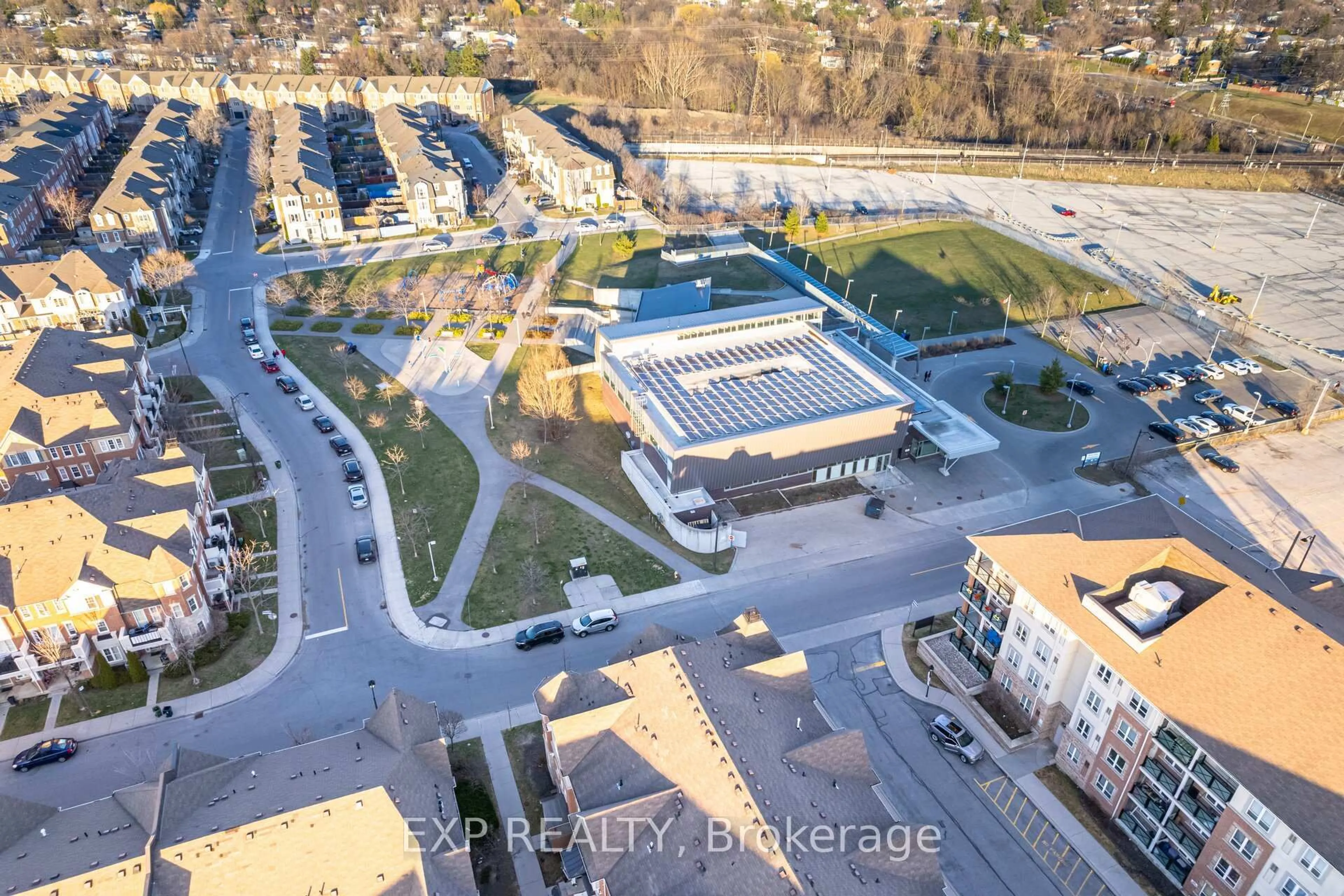 A pic from outside/outdoor area/front of a property/back of a property/a pic from drone, street for 60 Mendelssohn St #424, Toronto Ontario M1L 0G9