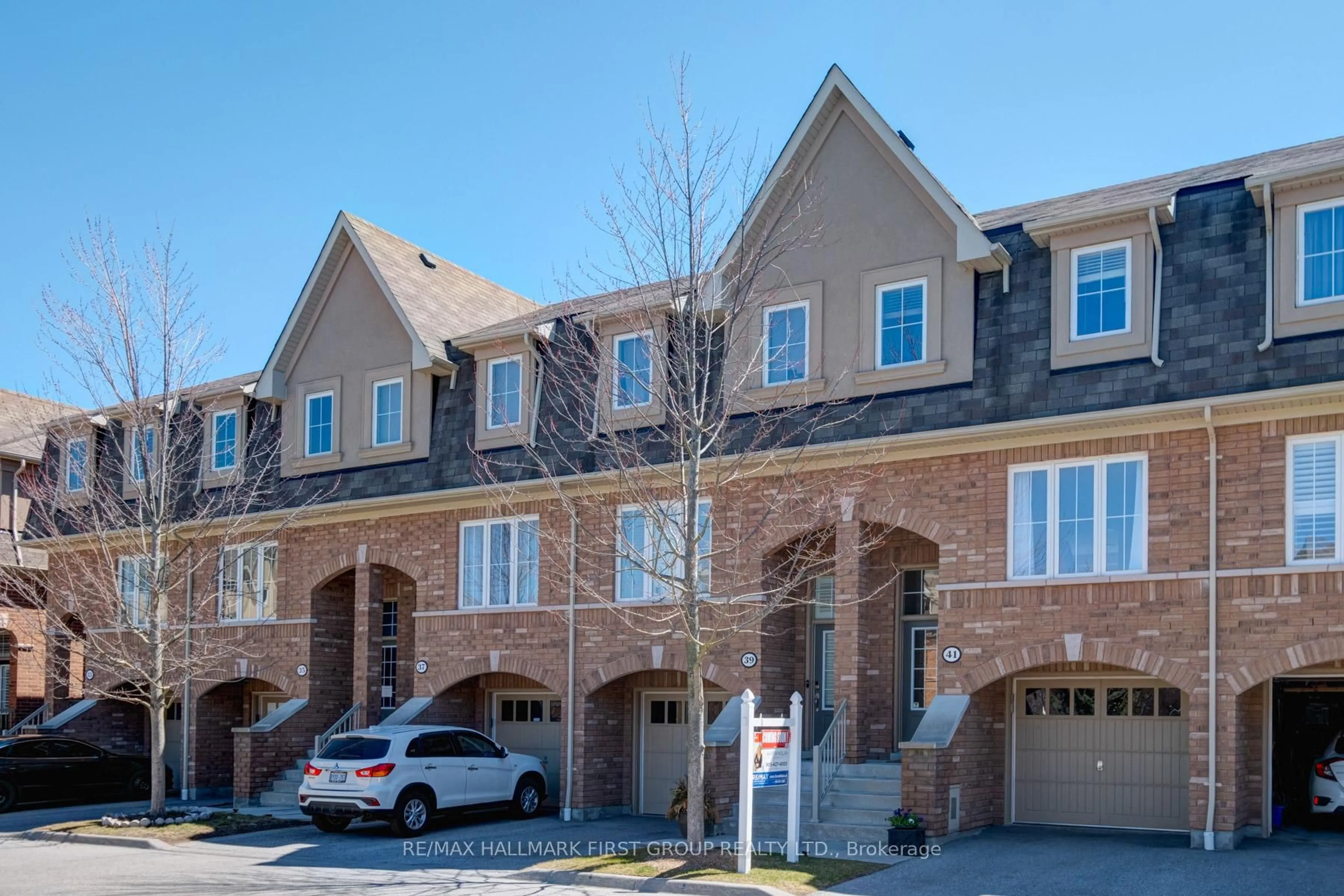 Home with brick exterior material, street for 41 Reevesmere Lane, Ajax Ontario L1Z 0C3