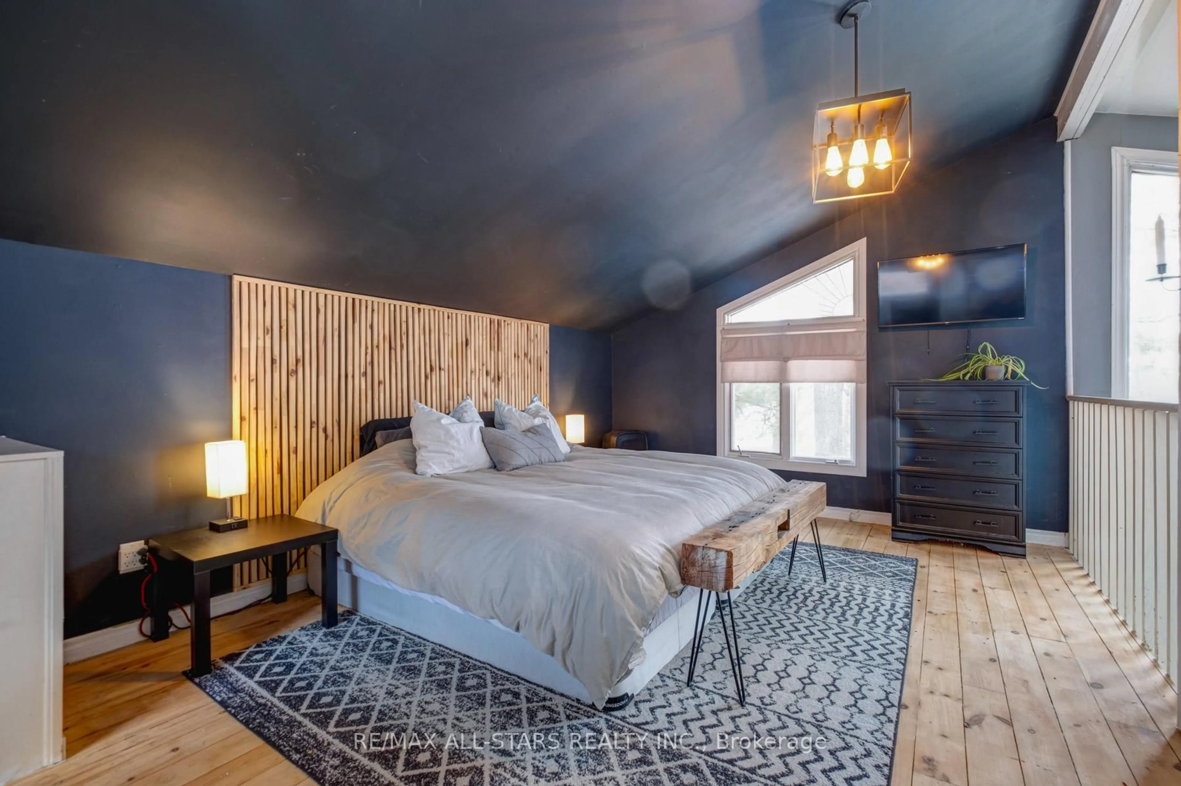 Bedroom with bed, wood/laminate floor for 126 Pine Point Lane, Scugog Ontario L9L 1B4