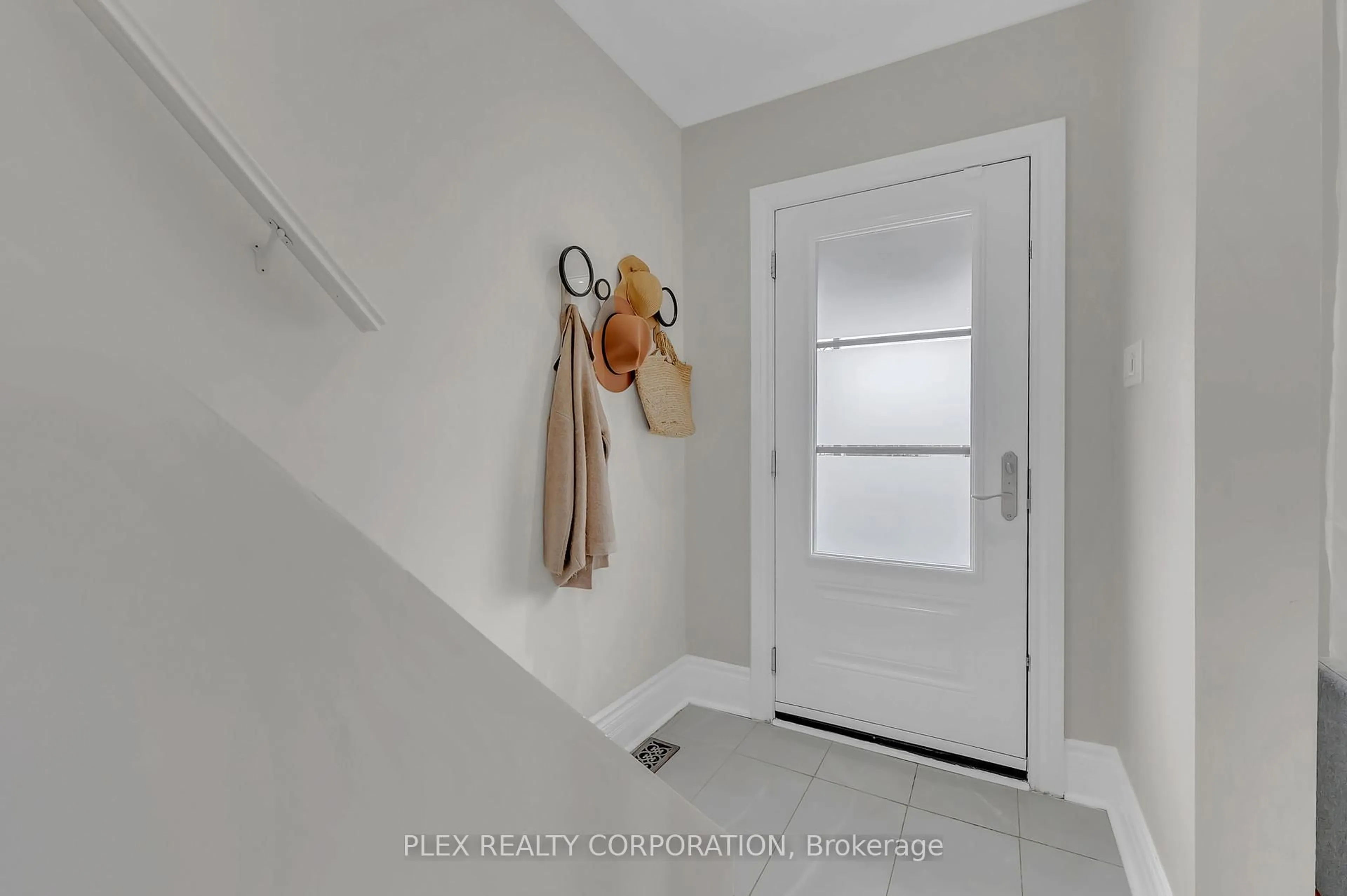 Indoor entryway for 52 Poucher St, Toronto Ontario M4J 2Y9