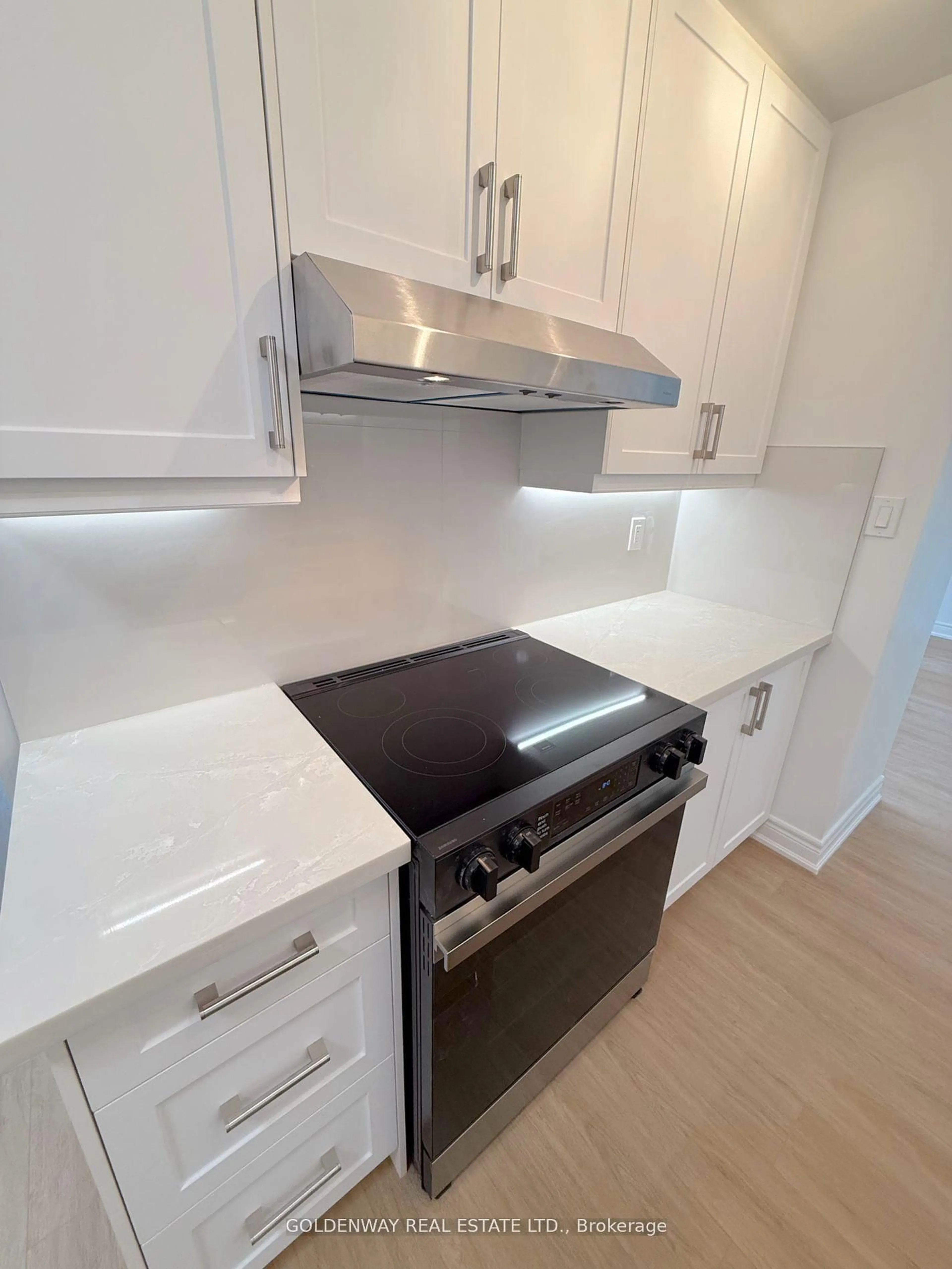 Standard kitchen, wood/laminate floor for 2050 Bridletowne Circ #411, Toronto Ontario M1W 2V5