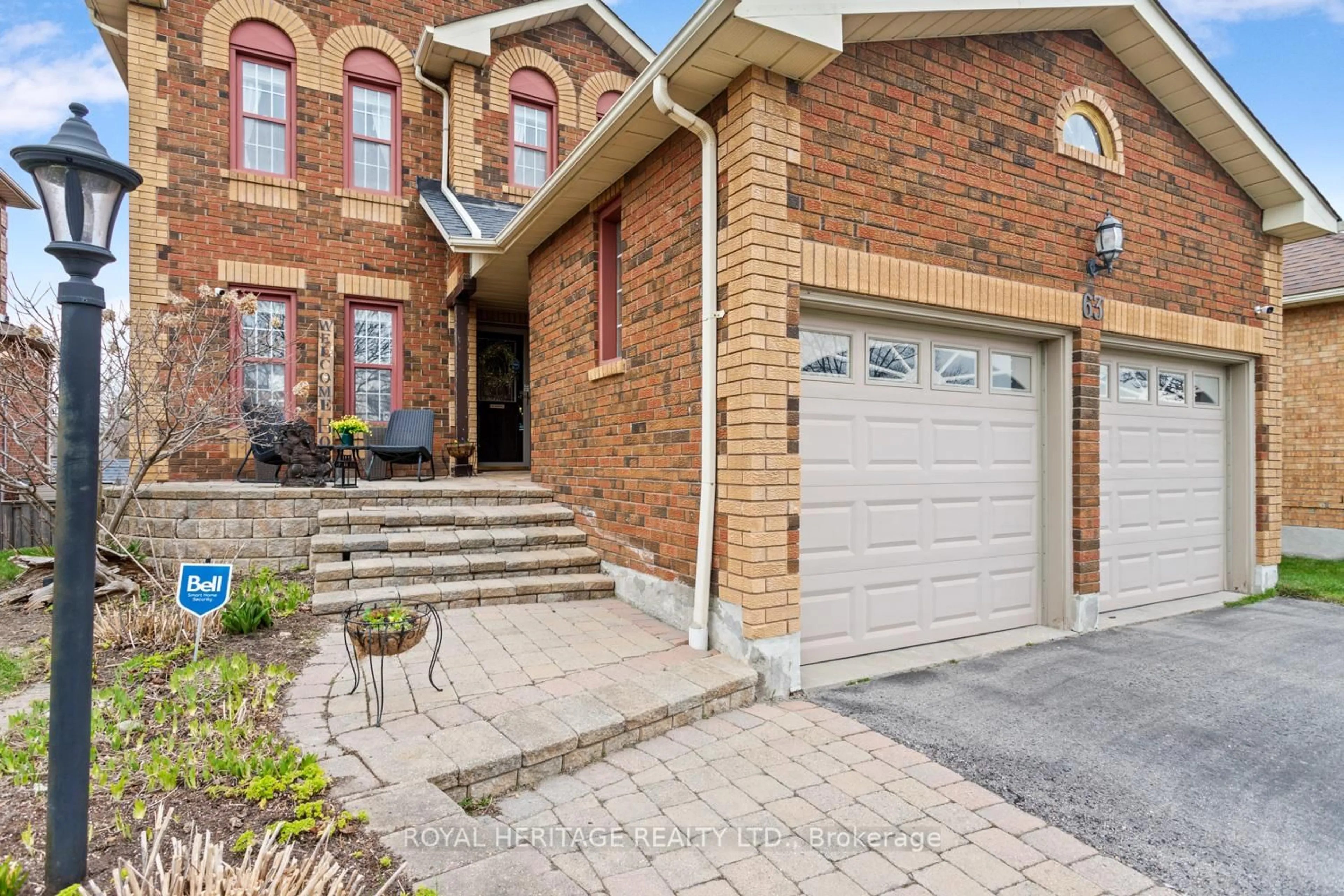 Home with brick exterior material, street for 63 Prentice Dr, Whitby Ontario L1N 9J8