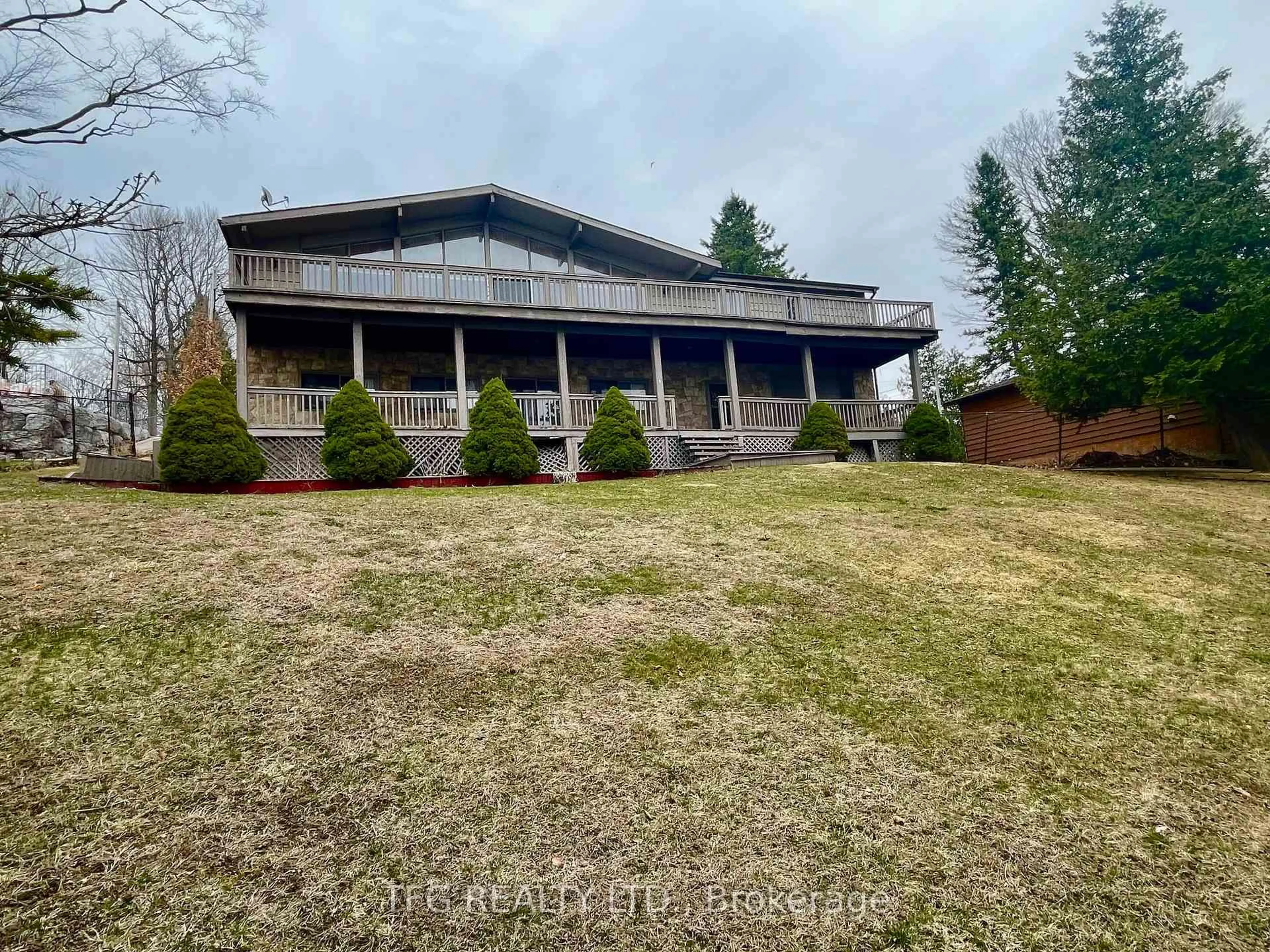 A pic from outside/outdoor area/front of a property/back of a property/a pic from drone, unknown for 466 Fralicks Beach Rd, Scugog Ontario L9L 1B6