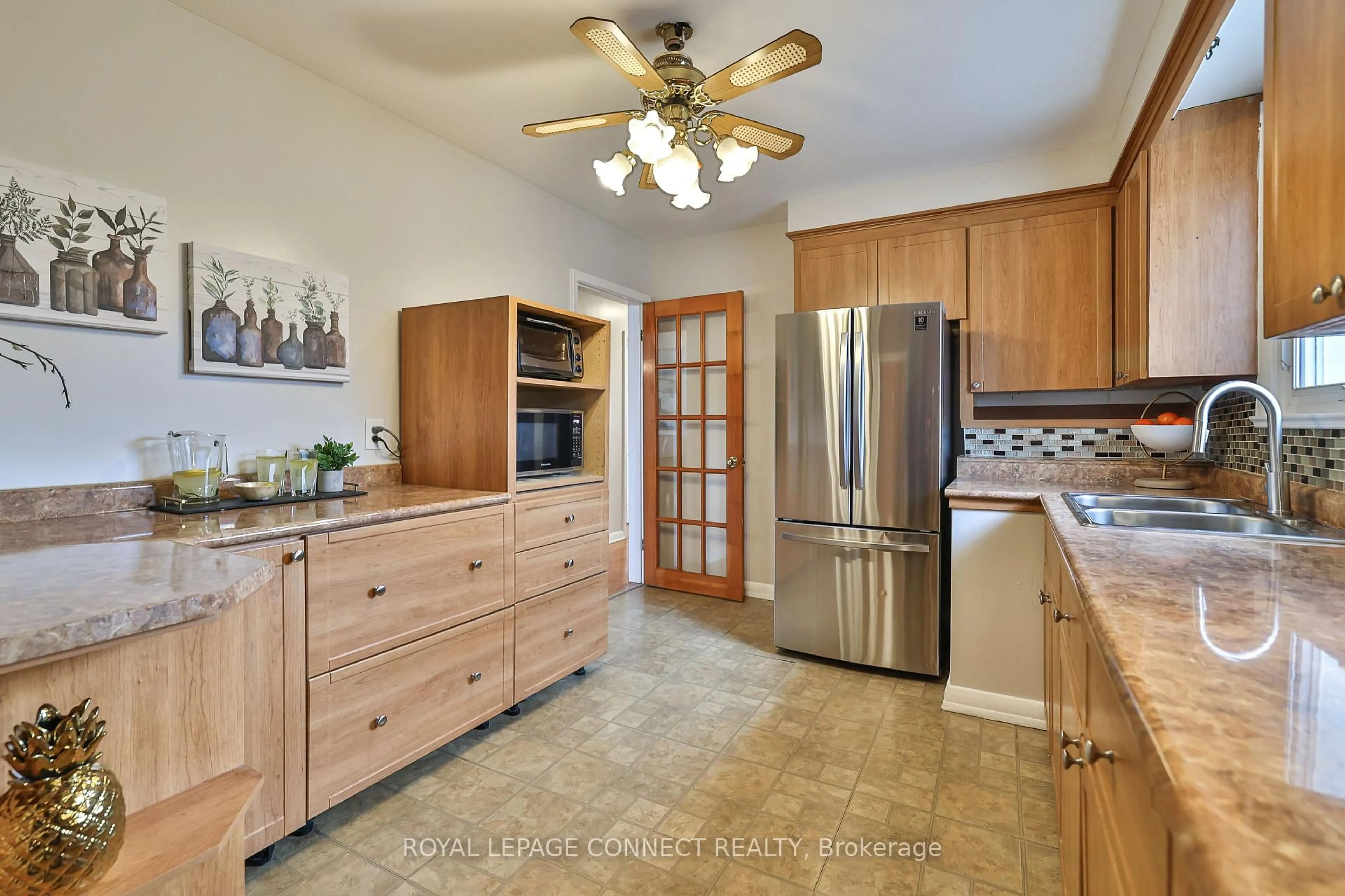Open concept kitchen, ceramic/tile floor for 103 Fitzgibbon Ave, Toronto Ontario M1K 4A4