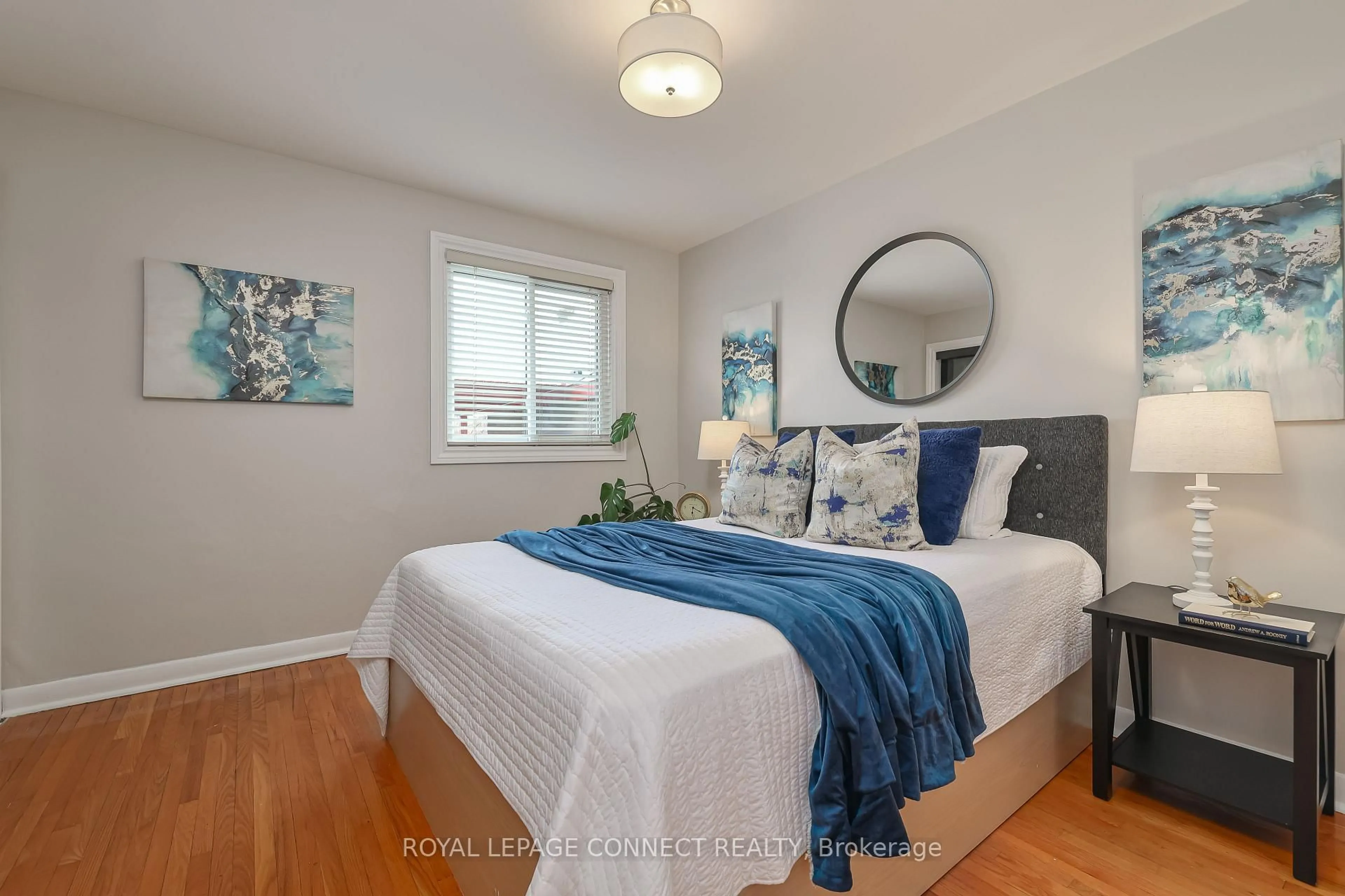 Bedroom with bed, wood/laminate floor for 103 Fitzgibbon Ave, Toronto Ontario M1K 4A4