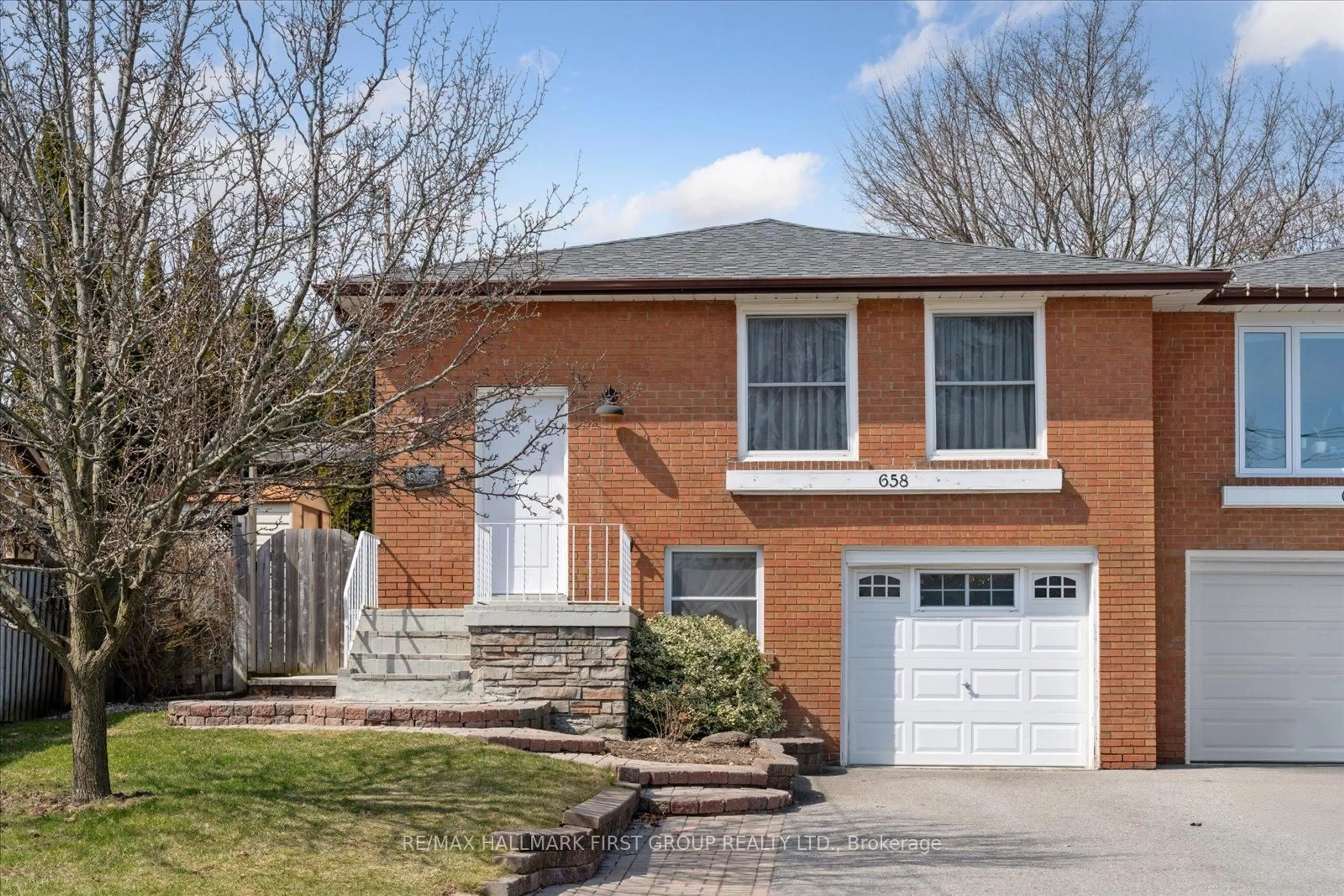 Home with brick exterior material, street for 658 Chipmunk St, Pickering Ontario L1W 2W1